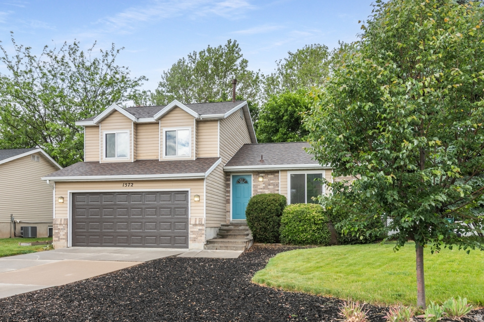 Mountain Views & Modern Comfort in the Heart of Kaysville! Welcome home to this impeccably maintained gem nestled in one of Kaysville's most highly desired neighborhoods. Perfectly blending functional design with premium upgrades, this residence offers the ultimate Davis County lifestyle. Every major system has been updated, offering you total peace of mind for years to come. This home boasts a brand-new roof, new insulated garage door, triple-paned windows, new water heater, new air conditioning system, and a new dishwasher. All the heavy lifting has been done-all you need to do is unpack! Step outside to your beautifully landscaped yard, where you are greeted by breathtaking, unobstructed 180-degree mountain views. Whether you're enjoying your morning coffee under the brand-new deck awning or hosting a summer BBQ on the pristine new patio, the outdoor living space is designed to impress. Situated in the vibrant heart of Davis County, you are just minutes away from Kaysville's top-rated parks, premier shopping, dining, and excellent commuter roads for a seamless drive north or south. Basement has the potential to add a third bathroom. Square footage figures are provided as a courtesy estimate only and were obtained from county records. Buyer is advised to obtain an independent measurement.