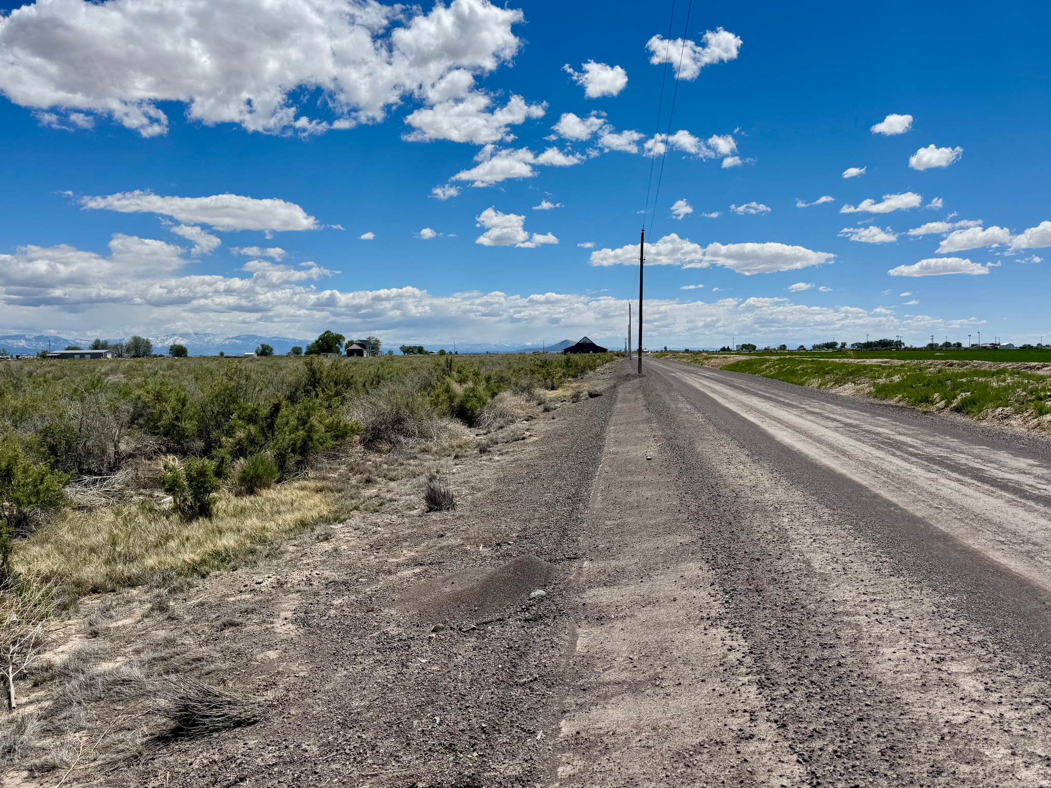 10.75 Ac lot on the outskirts of Delta. Additional 10.75 ac lot available to the south. Power in front along the road. Underground water rights are available to purchase from a separate seller. Zoned Ag1, so residential lots have to be a minimum of 1 acre. Some commercial uses allowed as well. Maps & address are approximate. Located on the east side of the road, so your frontage faces west.