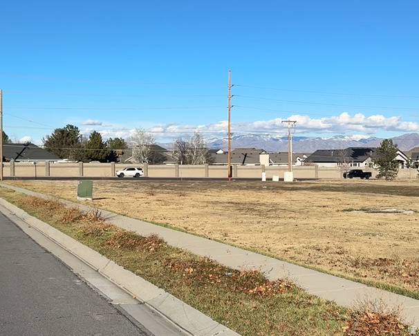 Flat, improved corner lot with excellent frontage on 90th South. Very high traffic count, exceeding 35,000 cars per day. Zoned for Professional Office, with potential conditional uses for a hotel or senior living. Also approved for fast food. Approved for up to three story construction. Easy access from 2040 West, with a bus stop directly in front on 90th South. Ideal location for medical, legal, or financial offices. -- Owner Agent