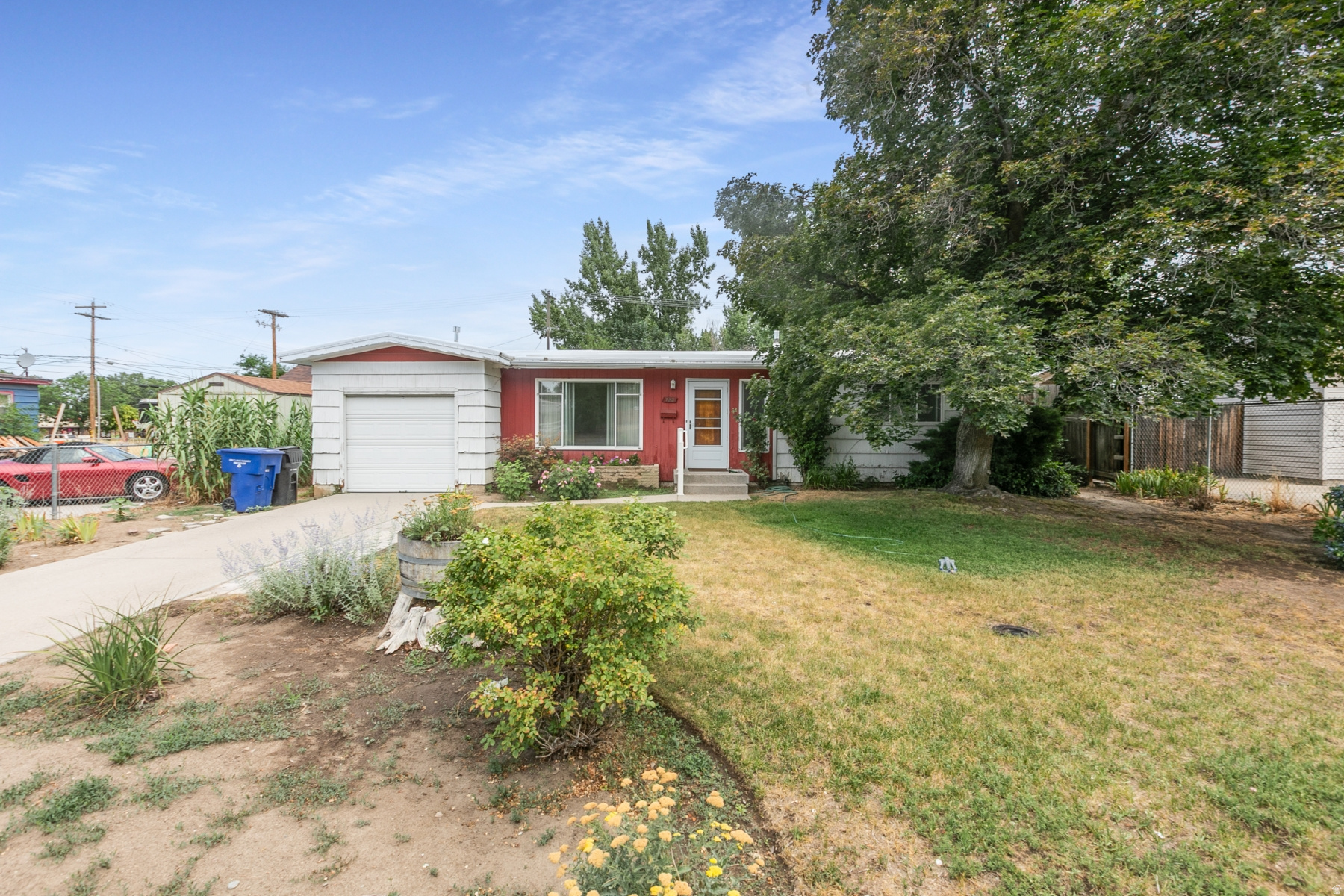 Welcome home to this charming 3-bedroom, 1-bath residence nestled on a spacious .21-acre lot in a desirable Sandy neighborhood within the highly sought-after Canyons School District. Offering 1,082 square feet of comfortable living space, this home is full of warmth and potential. Step outside to the large covered patio, the perfect place to enjoy summer barbecues, morning coffee, or relaxing evenings with family and friends. The generous backyard provides plenty of room for gardening, play, pets, or future possibilities. Whether you're a first-time homebuyer, looking to downsize, or searching for a place to make your own, this inviting home is ready to welcome its next owners.