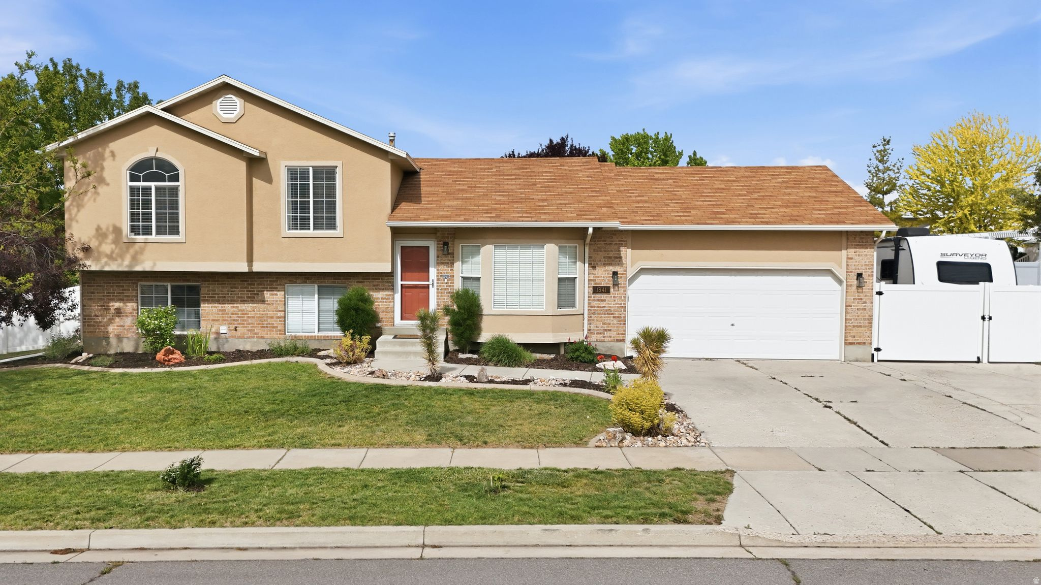Open house June 11th 5-6:30 pm Beautifully updated multi-level home situated on a quiet cul-de-sac corner lot in a highly convenient Layton location. Thoughtful upgrades throughout offer both style and peace of mind, including a new furnace and A/C (2024), new carpet (2026), updated tile flooring, and modern lighting and fixtures. The kitchen has been refreshed with quartz countertops, stainless steel appliances, a gas range, and a stylish backsplash, creating a functional and inviting space. The spacious primary suite features a fully remodeled bathroom (2024) with a jetted tub, separate shower, and updated finishes. Additional interior highlights include upgraded railing, improved lighting, and a finished basement offering flexible living space. Step outside to a fully fenced backyard designed for both relaxation and utility, featuring an oversized deck, mature landscaping, garden area, storage shed, and RV parking. Enjoy established fruit and garden features, including honeycrisp apple trees, blackberries, and grapevines. Located near Hill Air Force Base, parks, and everyday amenities, with convenient access to shopping, dining, and commuter routes.