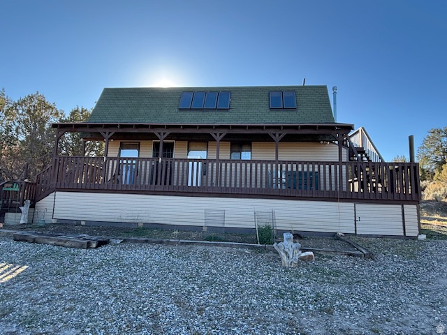 Awesome family getaway or all the time home!  Charming Cabin w/ new paint, carpet, deck, and more!  Wake up to deer outside your door and peace&quiet! home has water right owned & a well, full power, and propane for heat plus a wood burner.