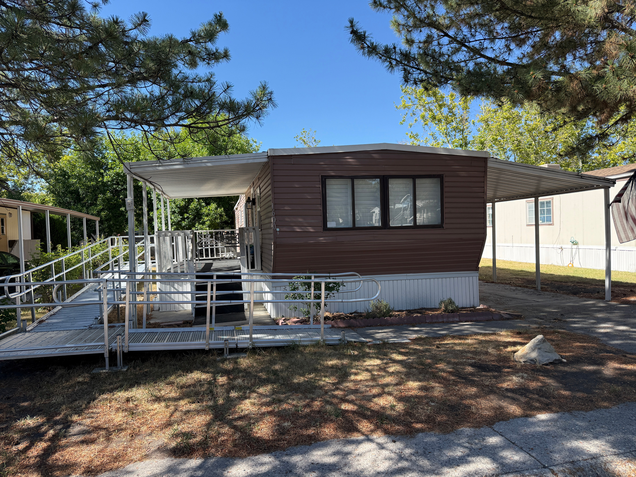 Affordable 2 bedroom, 1 bathroom manufactured home located in All Seasons Park, an over 55 community in Salt Lake City. This 1972 Fleetwood manufactured home is approximately 63 feet by 14 feet, estimated at approximately 882 square feet per lender documents. The home features an updated kitchen with granite countertops, newer gas stove, newer refrigerator, and updated cabinets. Bathroom updates include new granite countertops and updated cabinets. Additional features include plantation shutters throughout. Roof and HVAC system were reportedly installed within approximately the last 3 years. Gas stove and refrigerator are included. Per park management, the property is planned to be gated within approximately one month. Park approval required. Per information provided by park management, at least one occupant must be 55 or older, and the youngest permitted resident is 40 years old. Buyer and buyer's agent to verify all age restrictions, occupancy rules, application requirements, park approval requirements, park rent, utility charges, financing options, included appliances, planned gate installation, and all information directly with park management. Teri 385-249-7666. Park application and approval must be completed prior to submitting an offer. Buyer and buyer's agent should contact All Seasons Park directly, confirm all application requirements, complete the park approval process, and verify acceptance before writing or submitting a purchase offer.