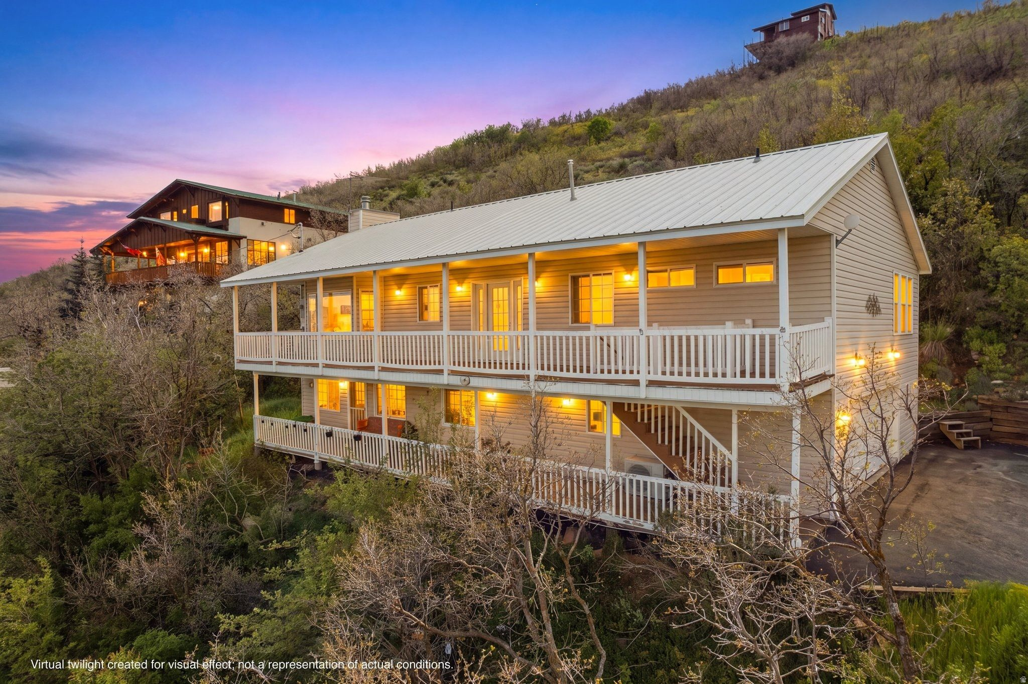 Tucked into the serene township of Interlaken, this secluded Midway location has easy, year round paved access delivering the views, land, and versatility that savvy buyers dream about. The main level offers 1,600+ sq ft of open-plan living under vaulted ceilings. Sweeping valley and mountain views that pour in natural light and changing views with every season. Two bedrooms, two updated bathrooms, and a large view deck make for an incredibly livable space, while newer mechanicals - furnace, water heater, and AC - mean the heavy lifting is already done. Downstairs, the 1,200+ sq ft walkout basement is a fully self-contained 2-bedroom, 1-bathroom apartment complete with its own kitchen, living room, laundry, and a second large deck overlooking the Heber Valley. Live upstairs and rent below, house extended family, or hold it as a straight investment - the flexibility here is yours to decide. An oversized garage, a quiet cul-de-sac setting, and .77 acres of elbow room round out a property that's move in ready and loaded with upside. Opportunities like this in Midway at this price point are few and far between.