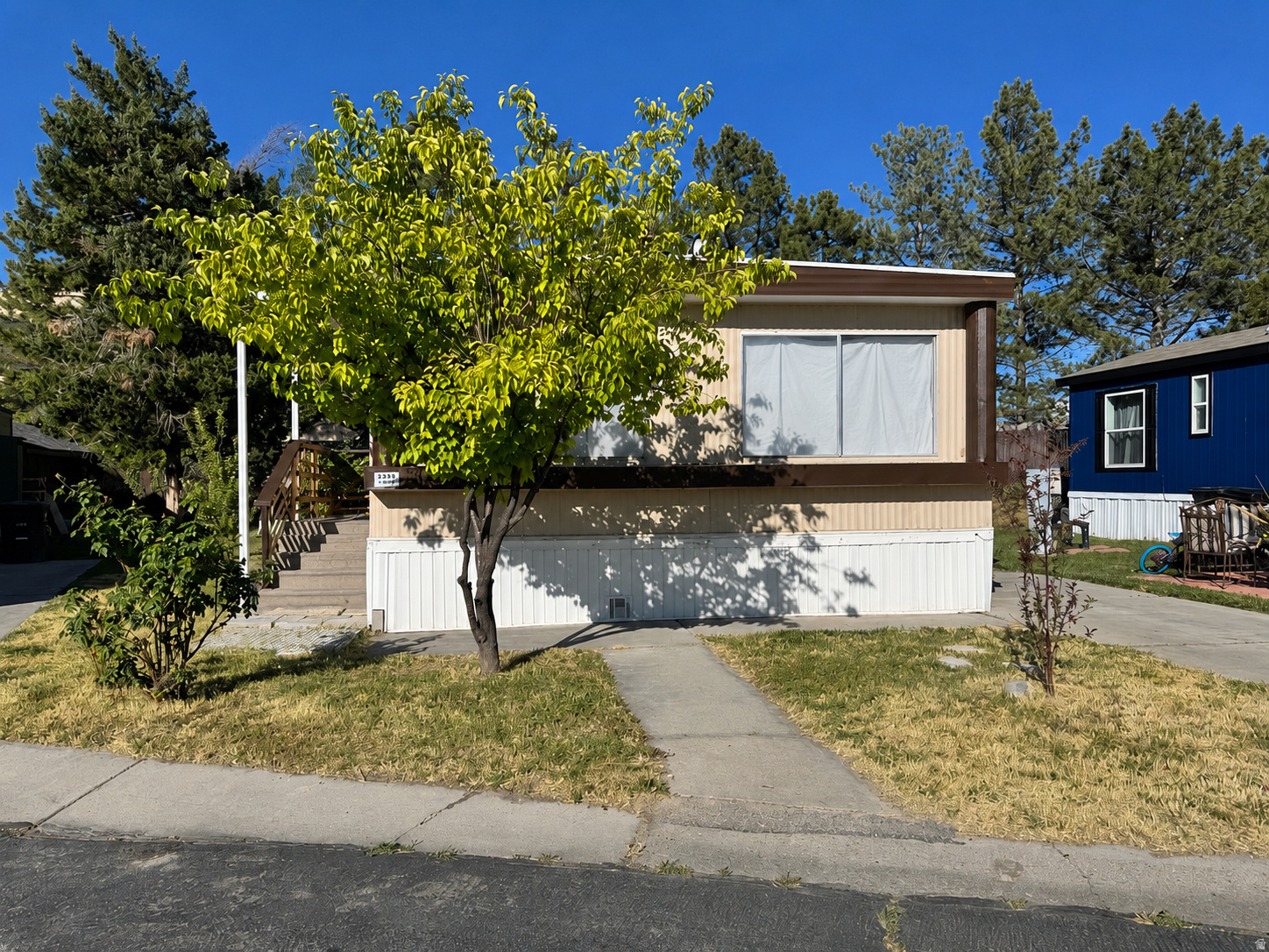 This double-wide home offers a spacious open-concept layout featuring 2 large bedrooms and 2 full bathrooms. With parking for 2 vehicles and a functional floor plan, this home is full of potential at an attractive price point. Seller financing may be available - contact listing agent for terms and details. Located in Westcrest Mobile Home Park, this home offers convenient access to shopping, restaurants, entertainment, schools, and everyday essentials, with quick access to Bangerter Highway and everything West Valley City has to offer. Community amenities include a pool, playgrounds, visitor parking, and pet-friendly living.  Buyer must be approved by park management. Application fee for new owners is $40 per person.  Square footage figures are provided as a courtesy estimate only. Buyer and buyer's broker are advised to verify all information. Schedule your private showing today!