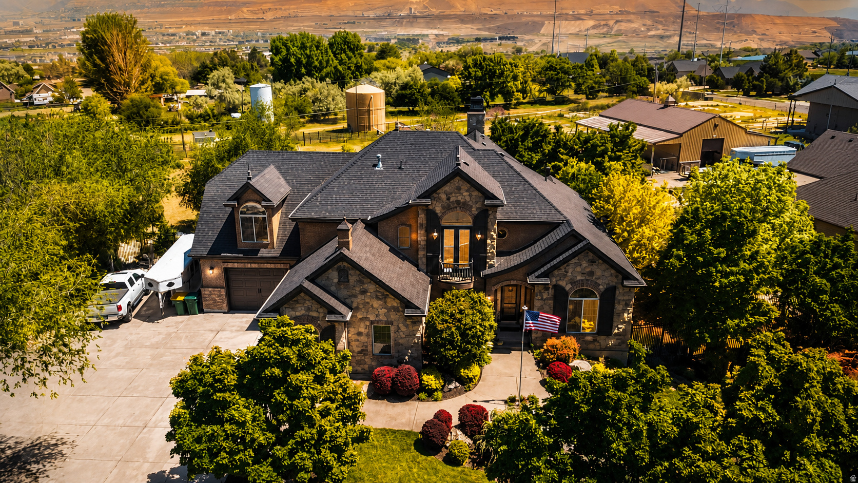 Open House this Friday June 12, 2026 from 5pm to 7pm and Saturday June 13, 2026 10am to 1pm!!***MOTIVATED SELLER BRING ALL OFFERS***Experience elevated living in this stunning Bluffdale estate, where luxury, comfort, and space come together in perfect harmony. Set on over an acre of pristine land, this remarkable property offers privacy, versatility, and the rare opportunity for equestrian use with ample room for horses, additional structures, or a custom outdoor retreat. Inside, the home showcases a thoughtfully designed layout with 6 spacious bedrooms and 5 beautifully appointed bathrooms, providing both functionality and elegance for everyday living and entertaining. At the heart of the home is a stunning kitchen, designed to impress with its upscale finishes, generous workspace, and seamless flow into the main living areas perfect for hosting or enjoying quiet nights in. A cozy fireplace anchors the main living space, adding warmth and inviting ambiance. The recently finished walk-out basement is a true showpiece, featuring soaring 12-foot ceilings that create a bright, expansive environment rarely found in lower levels, along with a custom wine cellar that adds a refined, luxurious touch.Every detail has been curated for comfort and convenience, including permanent LED EverLights that enhance the home's exterior with year-round ambiance and effortless holiday lighting. Step outside to your private backyard retreat, complete with a large deck and water feature, a 10-foot fence surrounds the entire property for exceptional privacy. Enjoy the wide-open space, breathtaking surroundings, and peaceful atmosphere that only a property of this size can offer. Whether you're entertaining, relaxing, or embracing a more open lifestyle, this estate delivers an unmatched living experience. A rare blend of luxury finishes, modern amenities, and expansive land-this Bluffdale property is truly one-of-a-kind.