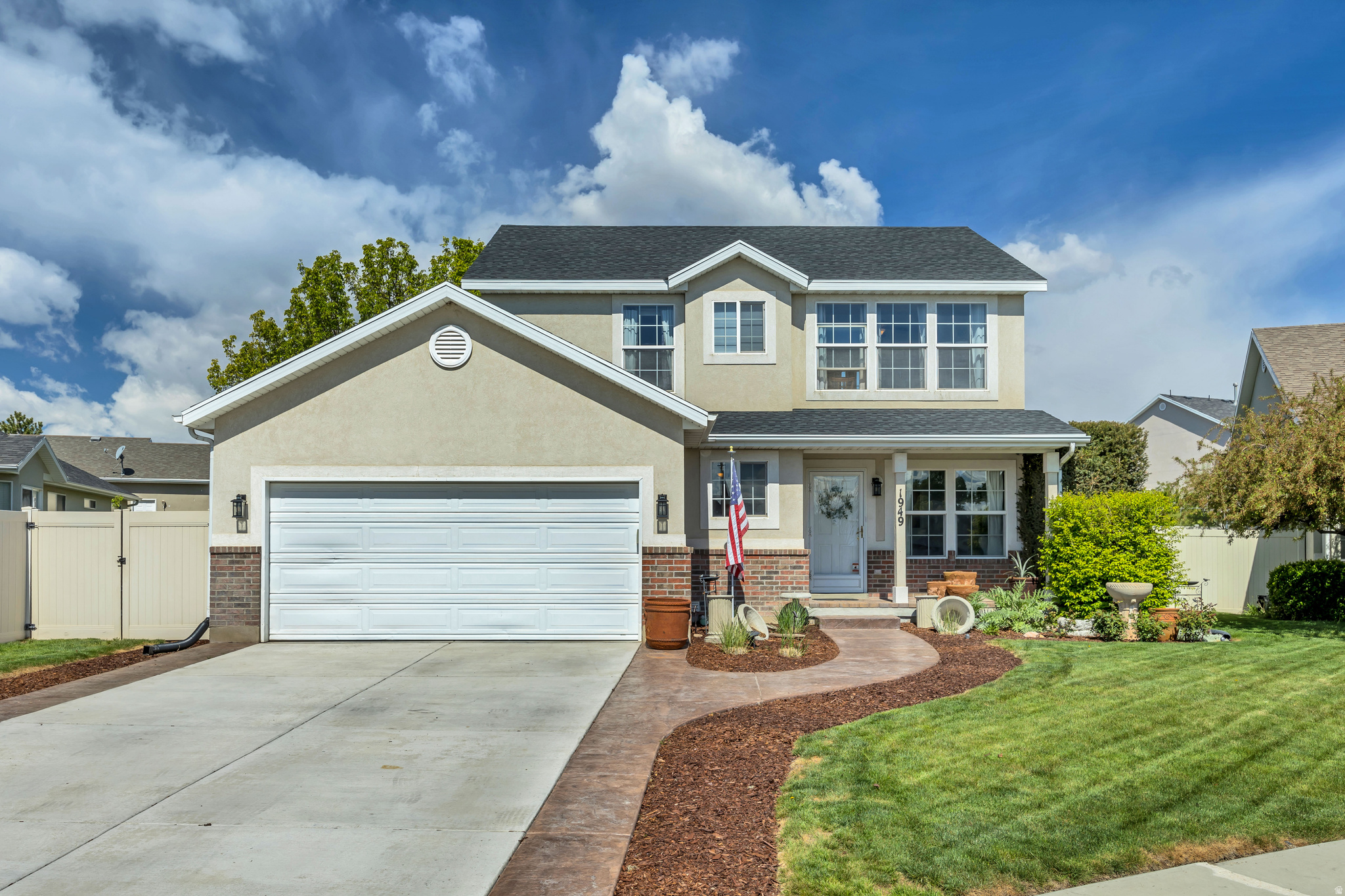 Delightful two-story home in the desirable Harvest Hills subdivision of Saratoga Springs, nestled in a quiet cul-de-sac with lake and mountain views. Enjoy being directly across from a neighborhood park, with additional pickleball courts as a sought-after amenity within the community. The home features a large Trex deck (approx 12 x20) off the kitchen dining area-perfect for outdoor entertaining and relaxing. Well maintained with a new roof (October 2025), updated furnace and A/C (2020), a new driveway, and a charming paver front porch, this home offers both comfort and peace of mind. A rare combination of location, views, and upgrades makes this home an exceptional find. Square footage figures are provided as a courtesy estimate only and were obtained from appraisal.  Buyer is advised to obtain an independent measurement.