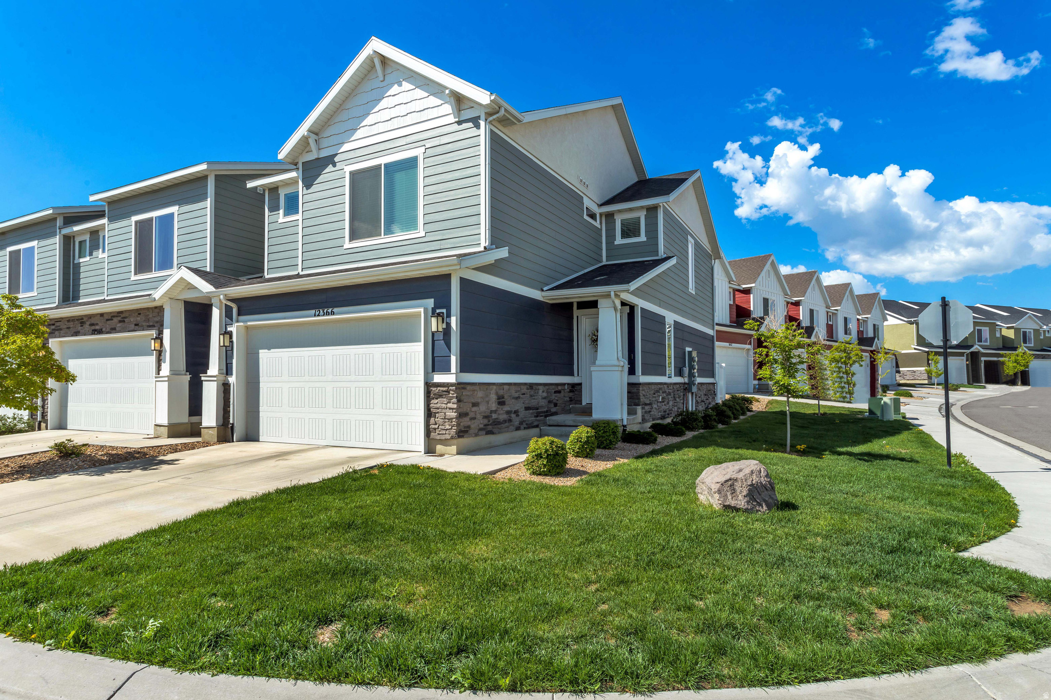 If convenience and floorpan are everything, then this house has it all!  Welcome to this spacious end-unit townhome with an inviting open floorplan and abundant natural light. The main level offers seamless flow between living, dining, and kitchen spaces boasting lots of storage and space to spread out. Upstairs features 3 generously sized bedrooms, 2 full baths, laundry, and a spacious primary retreat with dual walk-in closets. The finished basement expands your living options with a large family room and convenient half bath. Ideally located close to shopping, restaurants, the Bees stadium and seemingly endless daily conveniences.