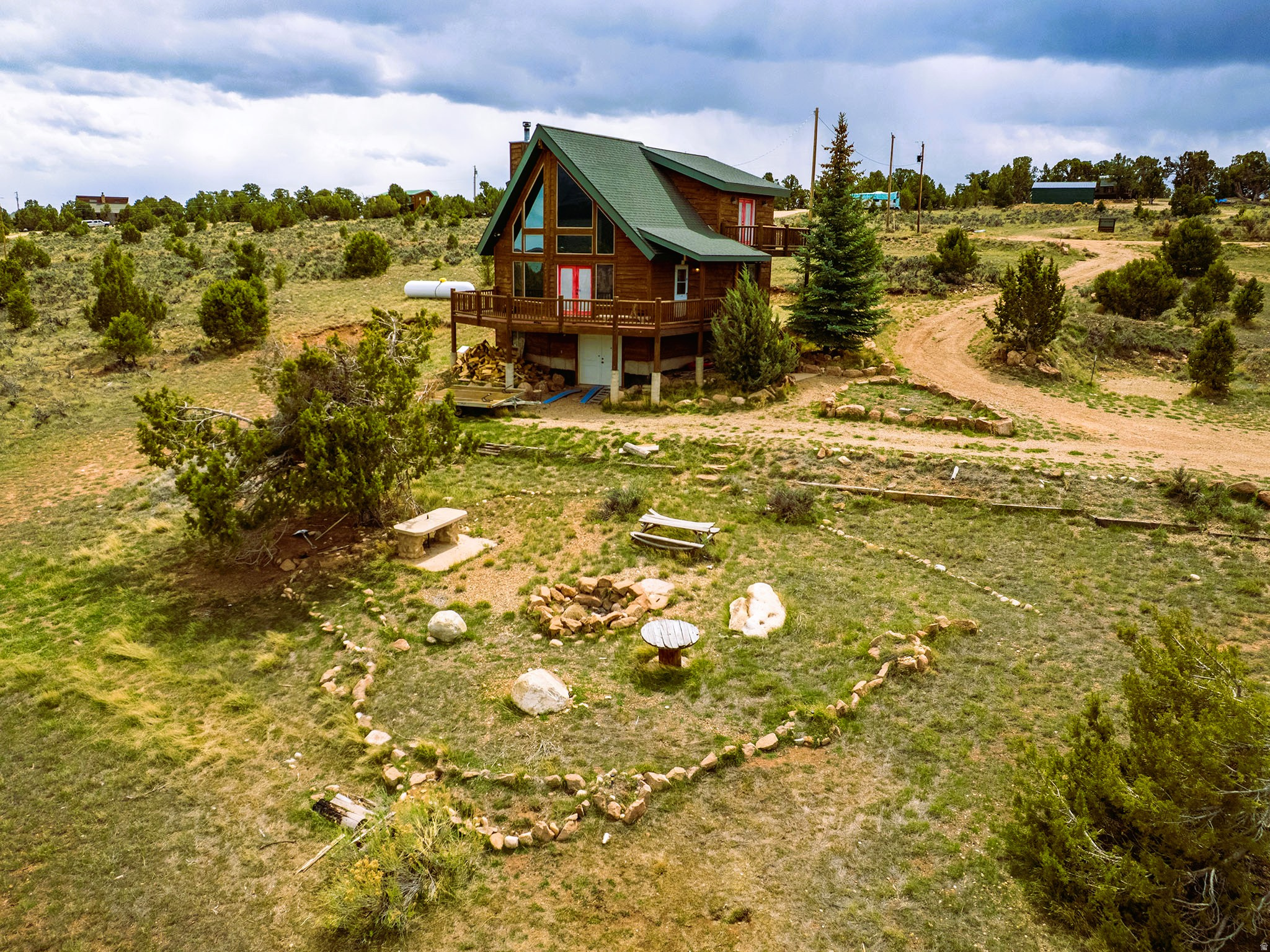 A beautiful two-bedroom, three-bath cabin tucked away in Fruitland, Utah, set on 5 private acres. Conveniently located just a short drive from Strawberry Reservoir and Starvation Reservoir. This well-maintained retreat features rich wood flooring, dramatic floor-to-ceiling windows, and stunning panoramic views. The perfect opportunity to escape the hustle and bustle of city life.    Cabin comes fully equipped with appliances including washer & dryer.  New septic in the last few years.  Square footage figures are provided as a courtesy estimate only and were obtained from previous listing .  Buyer is advised to obtain an independent measurement.