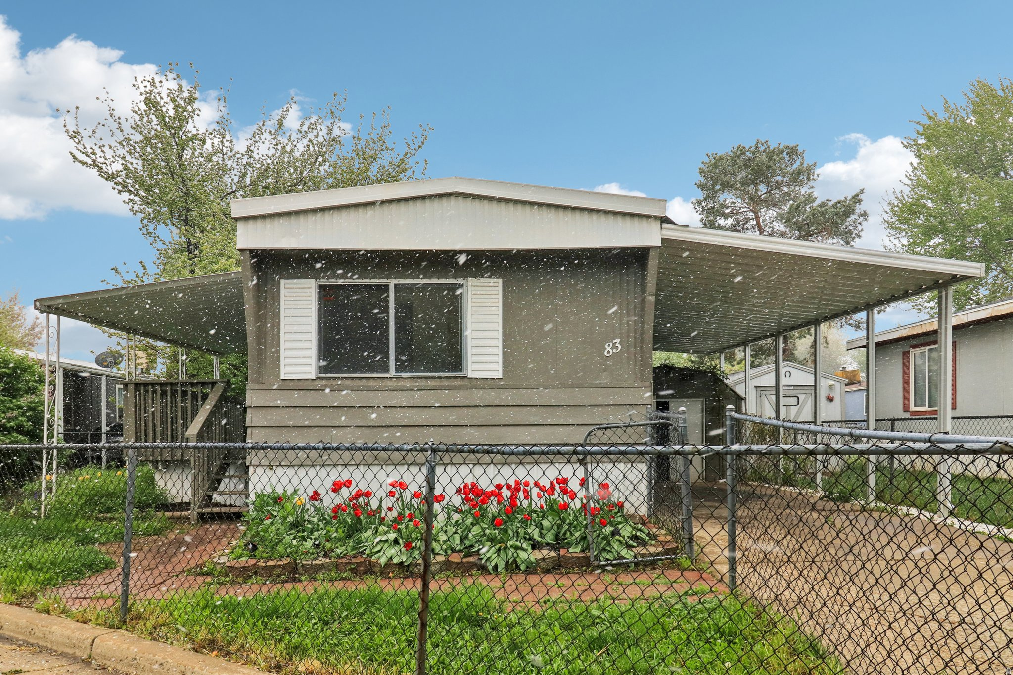 Tucked in a quiet, owner-occupied community in Ogden, this cozy single-wide offers a great opportunity to make it your own. Conveniently located less than 2 miles from I-15, you'll enjoy easy access while still feeling tucked away from the hustle. The location truly stands out-within 1 mile of grocery stores, a mall, Home Depot, and a variety of restaurants, plus just about 3 miles from the UTA FrontRunner station for an easy commute. Situated directly across from a small neighborhood park with playground equipment, the setting adds a nice sense of space and charm. The property features a fruit tree in the yard and a storage shed for added convenience. With a little vision and some updates, this home is ready for its next chapter-whether you're looking to personalize your space or invest in a project with potential.