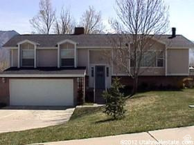 Agent owned.  One acre in Highland.  Home is rentable, as is the two bedroom appartment.  Perfect for a demolish and dream home build. Several similar new homes have been built on the street.  Home is usable condition but is dated.