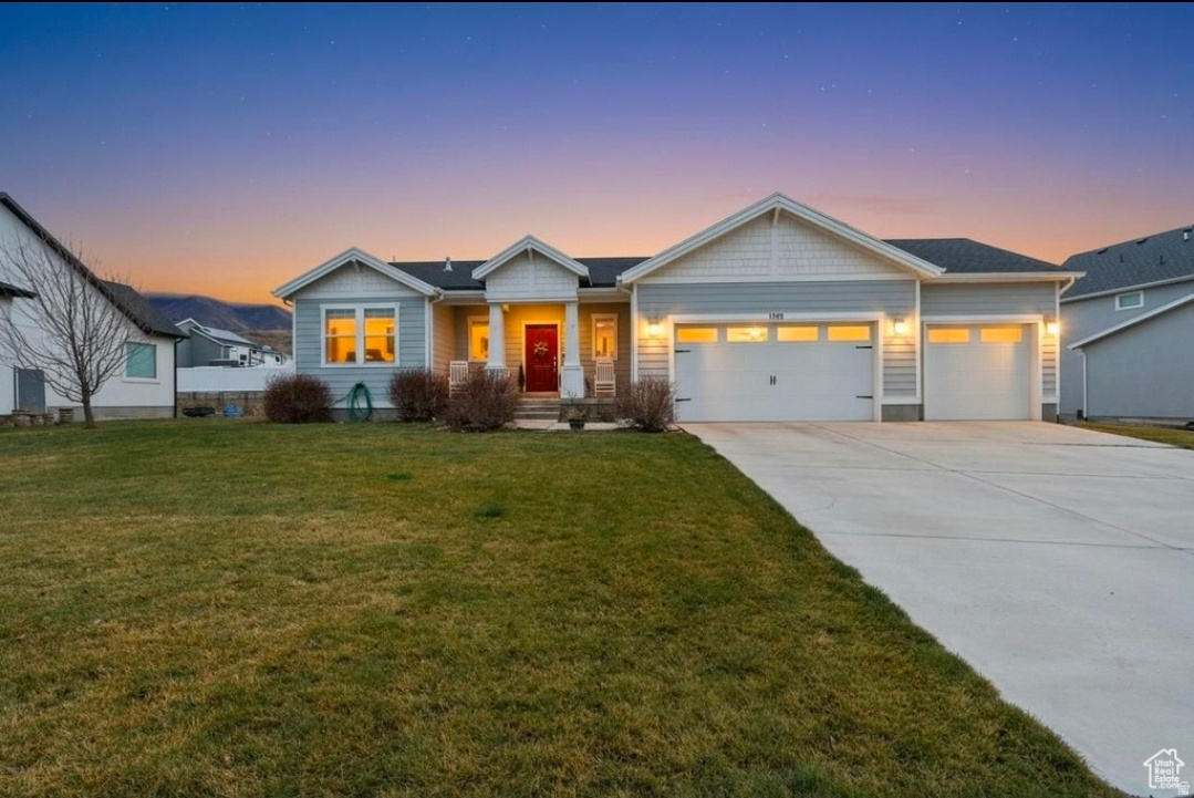 One of the largest and most upgraded floorplans in the entire community. Thoughtfully designed with space, style, and comfort in mind, this home offers the rare combination of modern finishes and a wide-open, functional layout that today's buyers crave. The Grand Kitchen is truly the heart of the home, featuring an oversized island, extra cabinet storage, and expansive counter space, perfect for entertaining, meal prep, and gathering with family and friends. The open-concept design flows beautifully into the living and dining areas, creating a bright and welcoming atmosphere. The Grand Master Suite is your private retreat, complete with a spa-style master bathroom that includes upgraded space and storage, giving you the luxury feel of a custom home. Downstairs, you'll find 9-foot ceilings in both the basement and main level, making the entire home feel open, tall, and airy, ideal for future finishing, a home theater, gym, or additional bedrooms. A rare 3-car garage provides plenty of room for vehicles, toys, storage, or a workshop, while the home's newer construction means modern systems, energy efficiency, and peace of mind. Located in beautiful Santaquin, this home sits in a growing, highly desirable area with stunning mountain views, quick freeway access, and a quiet neighborhood feel, perfect for those who want space without sacrificing convenience. This is a big, beautiful rambler with all the right upgrades, homes like this don't come around often.