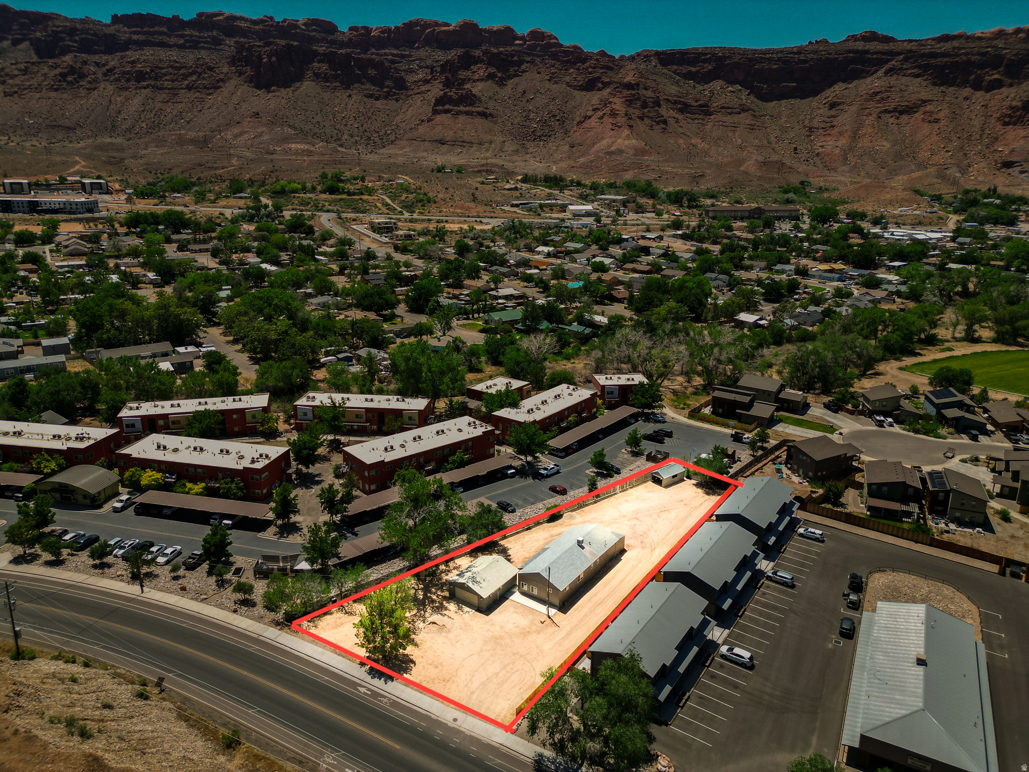 Located in a highly convenient Moab location with excellent access and functionality, this versatile property offers a rare opportunity for businesses seeking employee housing, contractor accommodations, equipment storage, or operational yard space. The existing structure is well-suited for workforce housing or long-term staff accommodations, while the expansive parking and storage areas provide ample room for vehicles, trailers, construction equipment, materials, and recreational assets. Ideal for construction companies, trades, outdoor recreation businesses, or service operators with an ongoing presence in the Moab market. The property's flexible layout, accessibility, and usable outdoor space create a highly practical solution for companies needing both housing and operational support infrastructure in one location.