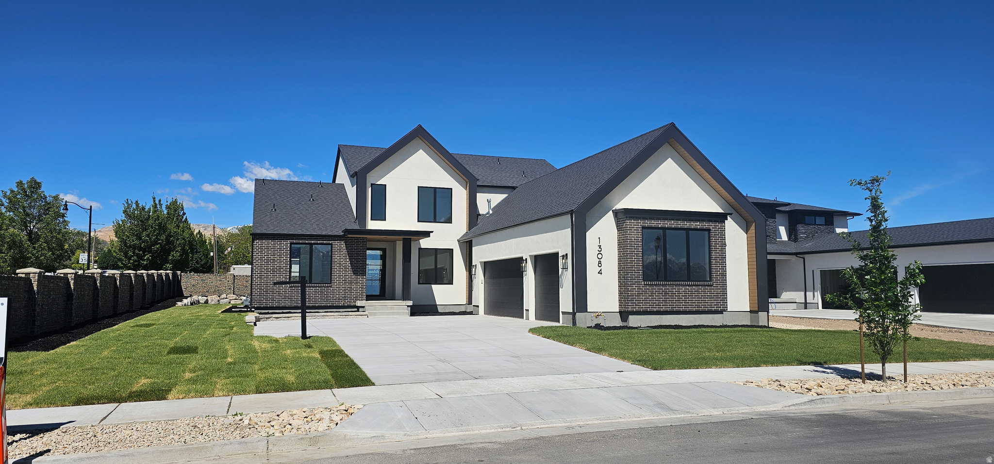 **INCREDABLE OPPORTUNITY**Welcome to this Stunning 6 bedroom, oversized Garage, beautifully crafted Home.  With bold architectural style and high end finishes.  Inside, the chef's kitchen impresses with two tone cabinetry , a large quartz Island, built in appliances, and designer pendant lighting all flowing seamlessly over light wood floors.  Additional highlight includes a second bedroom suite on the main floor, Open concept floorplan, and huge beautiful windows providing lots of natural light.