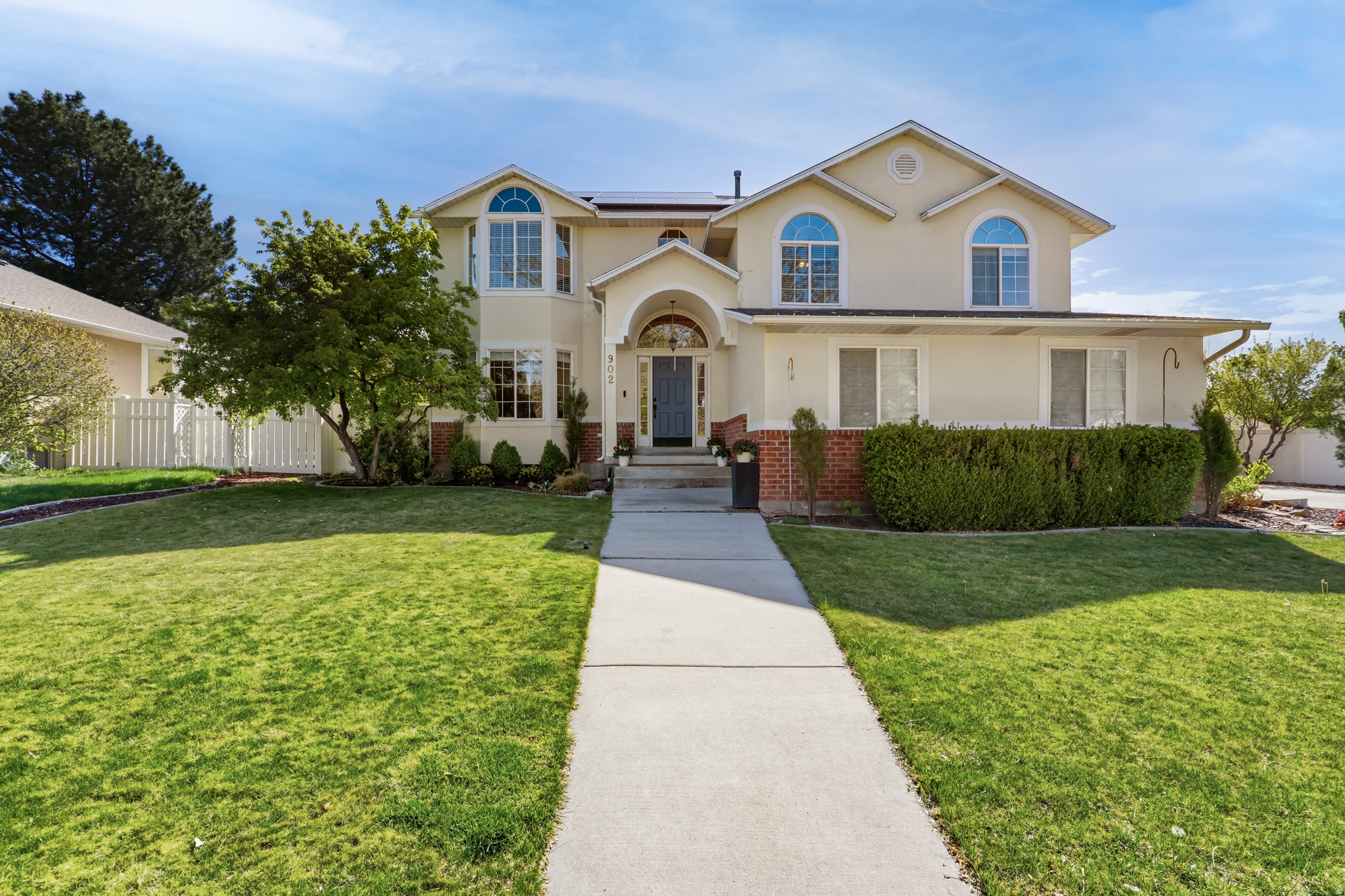 Tucked in a quiet American Fork neighborhood, this multi-level home offers the perfect blend of space and everyday comfort. With 5 bedrooms, 3.5 bathrooms and 3 living rooms, there's room to grow, host, and work from home with ease. The updated kitchen opens into a large family room featuring a thermostat-controlled fireplace-perfect for relaxing evenings or movie nights with friends. Upstairs, the spacious primary suite offers a peaceful retreat with vaulted ceilings, and a spacious bath with separate tub and shower. An additional three bedrooms on the next level are conveniently located near the laundry. The finished basement adds flexibility with a small family room, bedroom  and full bath-an ideal private living space for teens, guests & in-laws. Step outside to a fully fenced back yard complete with patio, mature trees, storage shed and dedicated garden area. The extra wide garage opens onto a spacious side drive with plenty of room for autos, bikes and ATV's.  You'll love the natural light that fills the home and benefit from the energy-saving solar panels (average electric bill: winter $8/mo, summer $20/mo), as well as the new furnace and A/C. Near Kimberly Park, shopping and schools.  Schedule your tour of this lovely home today  or join us at the open house, Saturday, April 25, 11 am to 2 pm.      *Measurements taken from County records. Buyer advised to verify.