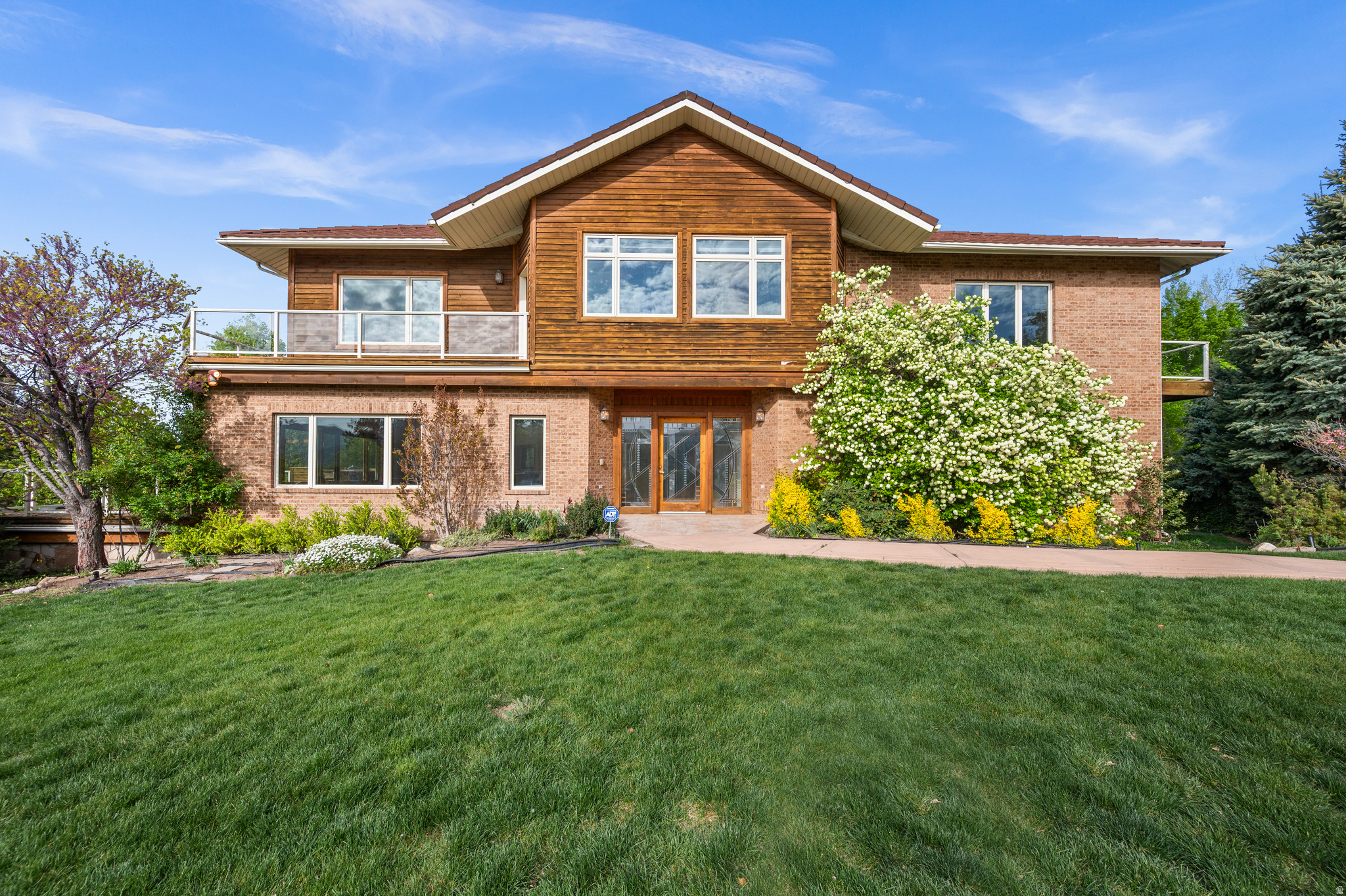 Custom built 2-Story estate in Capitol Hill designed for multi generational living and full accessibility. Incredible valley and mountain views and natural light throughout. The main and upstairs levels feature spacious floorplans, ample storage and full kitchens - plus an elevator to travel between floors. The basement has an additional bedroom, full bath and half bath. Fabulous amenities include an indoor swimming pool, heated sauna, exercise room, heated driveway, heated walkways and expansive 7 car garage with workshop. Amazing location near downtown, outdoor recreation and the Salt Lake City Airport.   Square footage figures from county records are provided as a courtesy estimate only.  Buyer is advised to obtain an independent measurement.