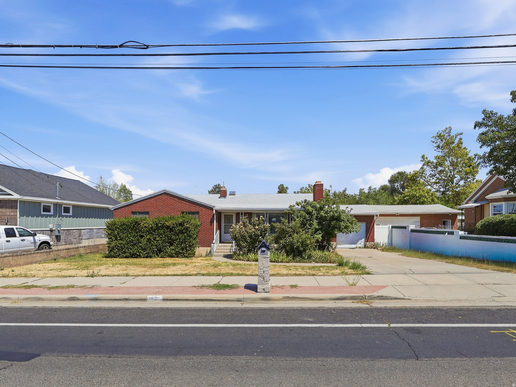 Solid opportunity on nearly a third of an acre! This 4-bedroom, 2-bathroom brick rambler sits on a spacious .32-acre lot, with a large backyard offering plenty of room to garden, entertain, or make your own. The main level features 3 bedrooms and 2 bathrooms, while the basement adds a 4th bedroom (potential for a 5th), laundry room, and generous storage space. A 1-car garage provides convenient parking and storage, and hardwood floors lie beneath the carpet throughout, ready to be uncovered and refinished. Bring your vision and make this Brick Rambler one your own -  great lot, great potential. View the 3D Tour and schedule your showing today!