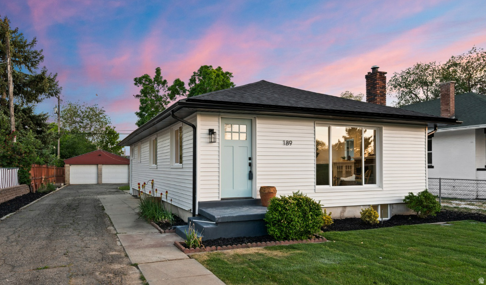 I don't say this very often but this one is a 'must see'! This extra cute home just underwent a full renovation. This home blends modern upgrades with warm, inviting living spaces. It is so spacious!! The thoughtfully redesigned open floor plan creates seamless flow between the kitchen, dining, and family room - perfect for entertaining or everyday living. Cozy up by the charming brick fireplace, glass front built in cabinets and large windows that fill the home with an abundance of natural light. The custom kitchen features brand-new cabinetry, quartz countertops, and stainless steel appliances. Enjoy peace of mind with extensive updates throughout, including new electrical, recessed can lighting, outlets, switches, newly tiled bathrooms, new faucets and most water lines as well a new electrical panel. New roof w/warranty. The home also features a brand-new high-efficiency furnace and central air conditioning for year-round comfort. Durable LVP flooring throughout offers both style and easy maintenance. The spacious primary bedroom includes dual closets and convenient access to a stackable washer and dryer setup, making everyday living effortless. New bathroom with elegant marble-inspired tile finishes. Downstairs, the fully finished basement offers even more living space with a large family room, two generously sized bedrooms, and a second full bathroom - ideal for guests, family, or a home office setup. The highlight of this property is the oversized, fully landscaped backyard complete with a large garden, one covered patio and one open patio, automatic sprinkler system - perfect for gatherings, play, or relaxing evenings outdoors. Detached 2-car garage with opener for both doors. Tons of parking. Walk to TRAX and parks. Close to freeway and shopping and schools nearby.
