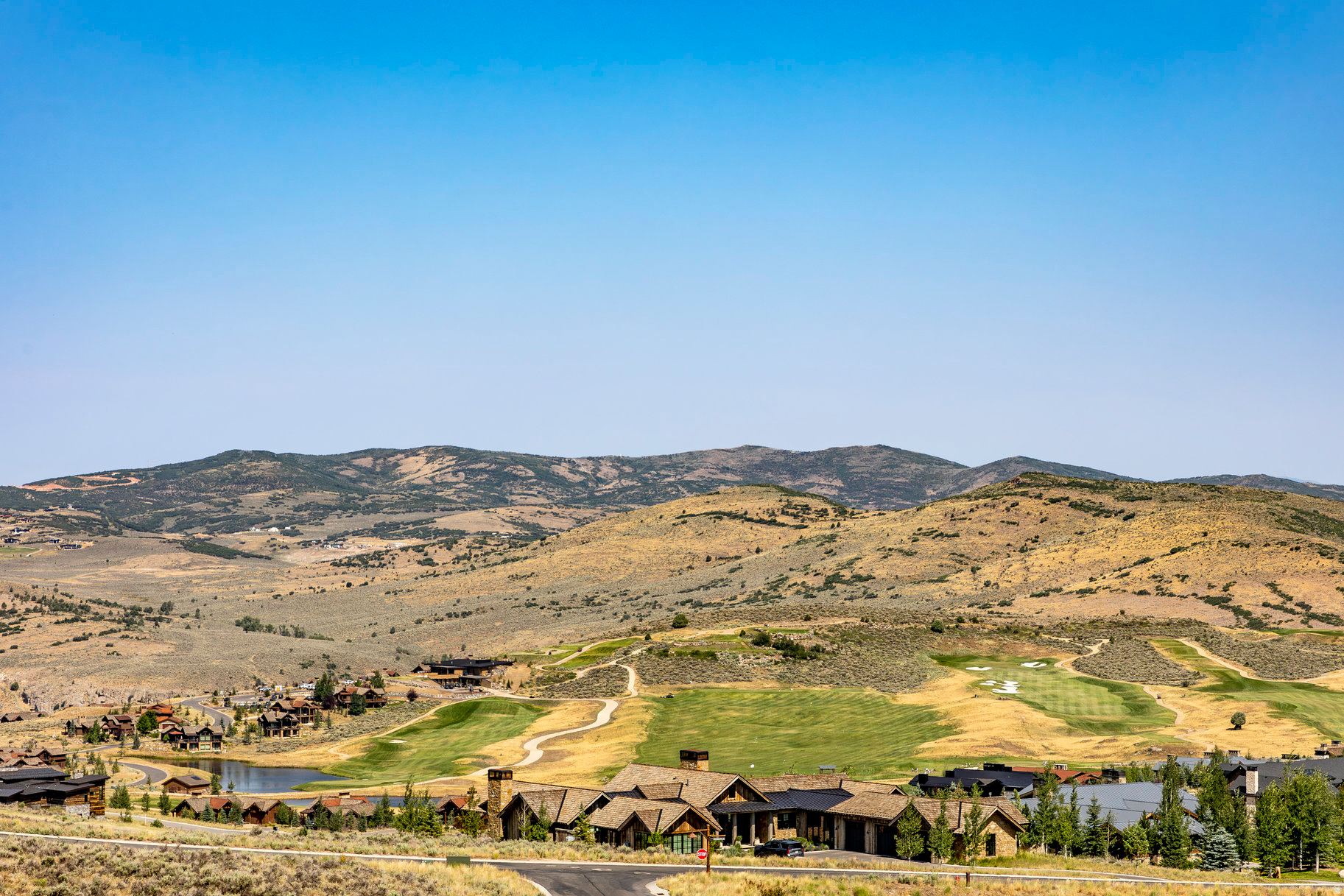 Set on 3.46 gently sloping west-facing acres, this exceptional homesite captures panoramic vistas stretching across Deer Valley, the championship golf course, and Flat Top Mountain-creating an extraordinary backdrop for a custom home designed around the beauty of every season. Ideally located just moments from The Barn, the new Golf Clubhouse, the Upper Provo River, and Victory Ranch's expansive backcountry, the property offers the perfect balance of tranquility and connection. Spend your mornings casting a line on blue-ribbon waters, afternoons exploring miles of trails or enjoying a round of golf, and evenings gathered with family as the mountains glow beneath a spectacular western sunset. Whether envisioned as a year-round residence or a mountain retreat, this homesite offers the rare opportunity to create a home that feels effortlessly connected to both nature and the unmatched lifestyle of Victory Ranch. Encompassing 6,250 pristine acres and four miles of the Upper Provo River, Victory Ranch is one of the West's most celebrated private communities. Residents enjoy an extraordinary collection of amenities, including championship golf, world-class fly fishing, hiking and biking trails, backcountry adventures, exceptional dining, a private ski-in/ski-out lodge in Park City, fitness and wellness facilities, and thoughtfully designed spaces where family and friends gather throughout every season.  Victory Ranch is a private, four-season community amidst 6,250 pristine acres along four-miles of the Upper Provo River. Amenities include an 18-hole Rees Jones golf course, world-class fly-fishing, fishing ponds, restaurants, a ski-in/ski-out lodge in Park City and more than 3,500 acres of untouched backcountry. Victory Ranch is approximately 25 minutes to Park City and 15 minutes to Deer Valley.