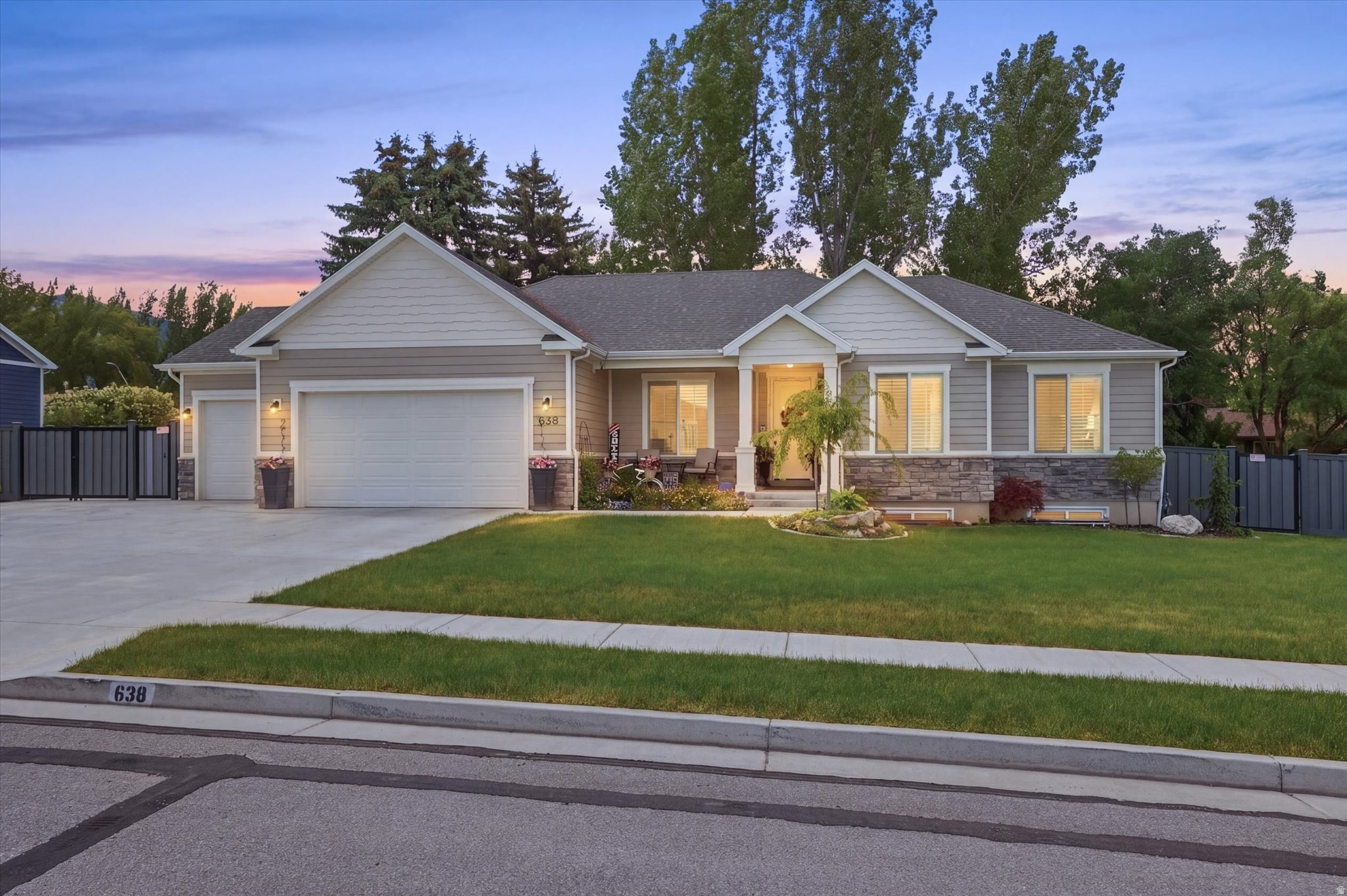 Located in an incredibly convenient location, this immaculate home offers the perfect blend of comfort, function, and high-end upgrades throughout. The thoughtfully designed floor plan creates an open and inviting feel with exceptional attention to detail at every turn. Step outside to a beautifully landscaped, fully fenced backyard featuring a massive Trex deck that's perfect for entertaining, relaxing, or enjoying summer evenings. Car enthusiasts, hobbyists, or business owners will love the large fully finished heated shop, offering endless possibilities. The oversized 3-car garage provides ample storage and workspace, while the countless upgrades throughout the home make it truly move-in ready. This is a rare opportunity to own a meticulously cared-for home that checks every box.