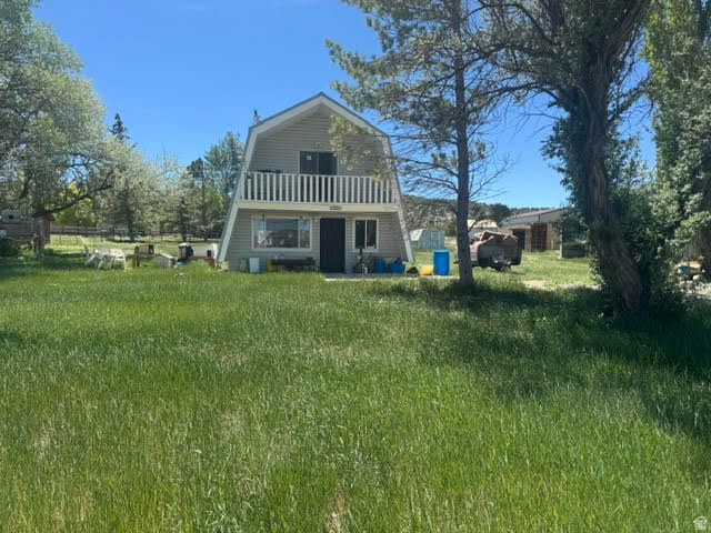 Located in a very desirable subd. very quite and away from the main community!  Just a few miles away from the Gorge, mountains and the Town of Manila.  Lot of room to play or build another garage.  2 sheds, large garage with a cover on the back for all your toys.