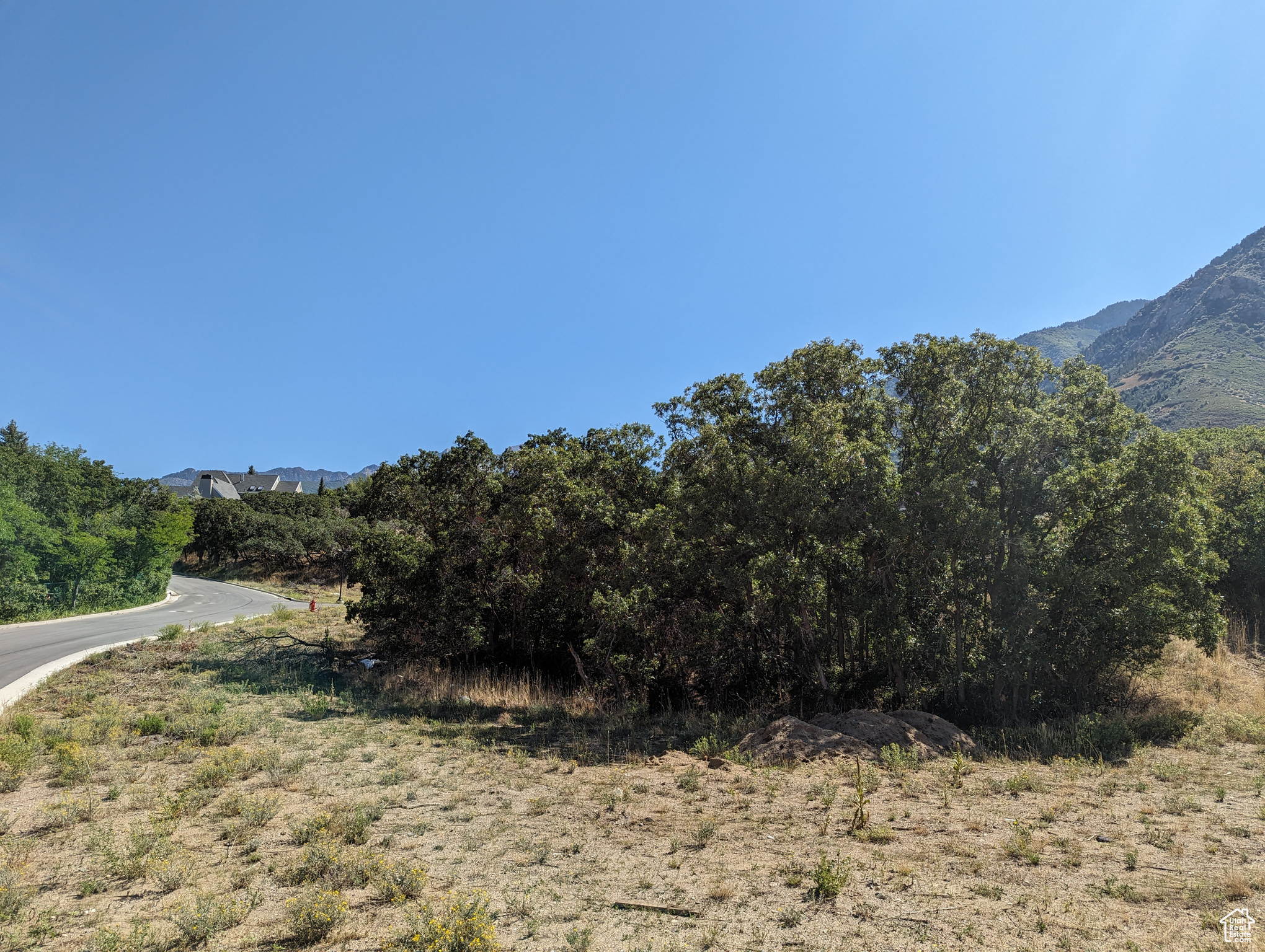 Located in sought-after 24-hour guard gated Pepperwood Community. Spectacular mountain view lot. Amenities include hiking/biking trails, pool, hot tub, pavilion, BBQ area, sand volleyball, basketball and tennis courts, pickleball, park, playground and onsite property manager. Incredible community with close proximity to the canyons for hiking and biking trails, world class skiing and snowboarding at Snowbird, Alta, and Park City Ski Resorts. Very few lots remain in this exclusive community. Best priced lot in Pepperwood!