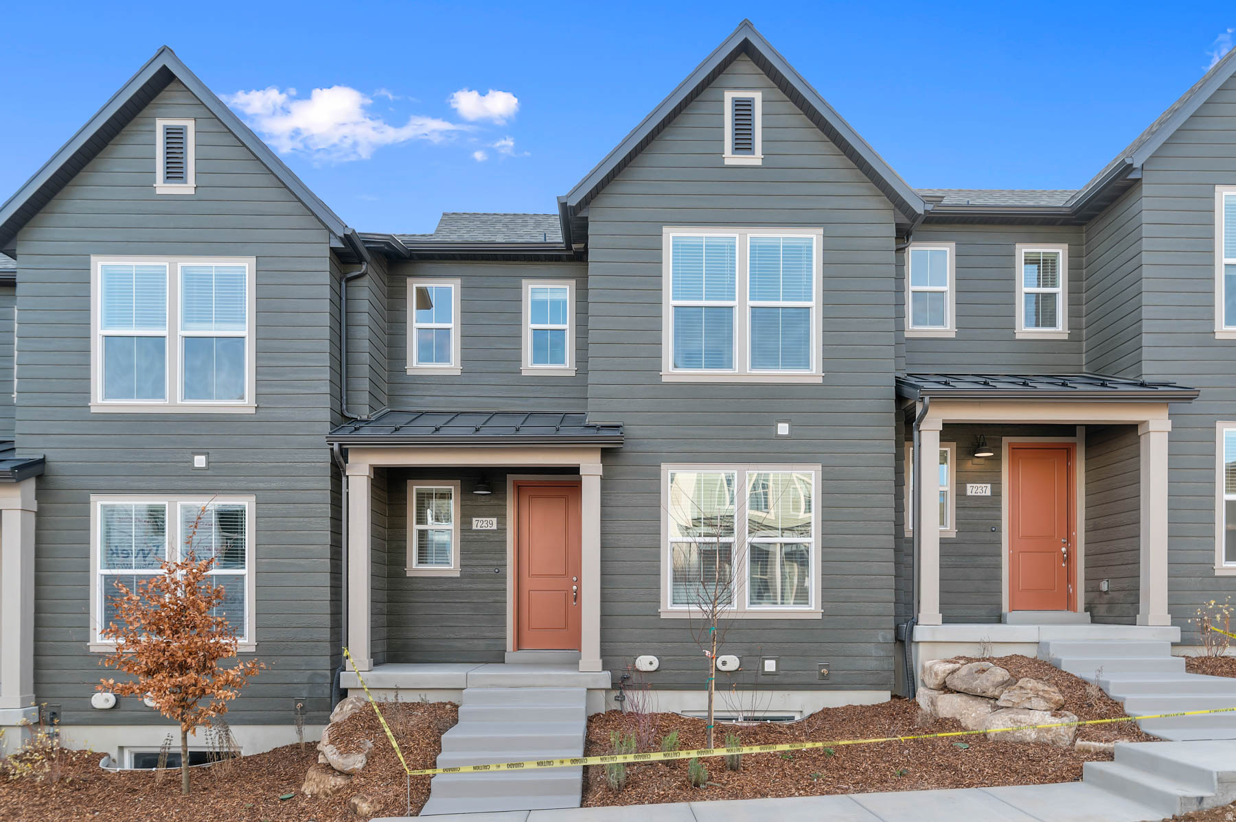 This Keetley town home features clean, modern style in a great master planned community! Includes a stylish kitchen with white laminate cabinets, durable quartz countertops, tile backsplash and stainless steel gas appliances. The interior blends comfort and practicality with laminate hardwood, vinyl tile, and carpet flooring. Enjoy the bonus of a finished basement space, perfect for additional living or storage needs. Energy-conscious touches include a tankless water heater and energy efficient options. Thoughtful finishes like Craftsman base & casing, cultured marble shower surrounds, and satin & brushed nickel hardware complete this well-balanced and inviting home. Comes with landscaping for a turn key experience!