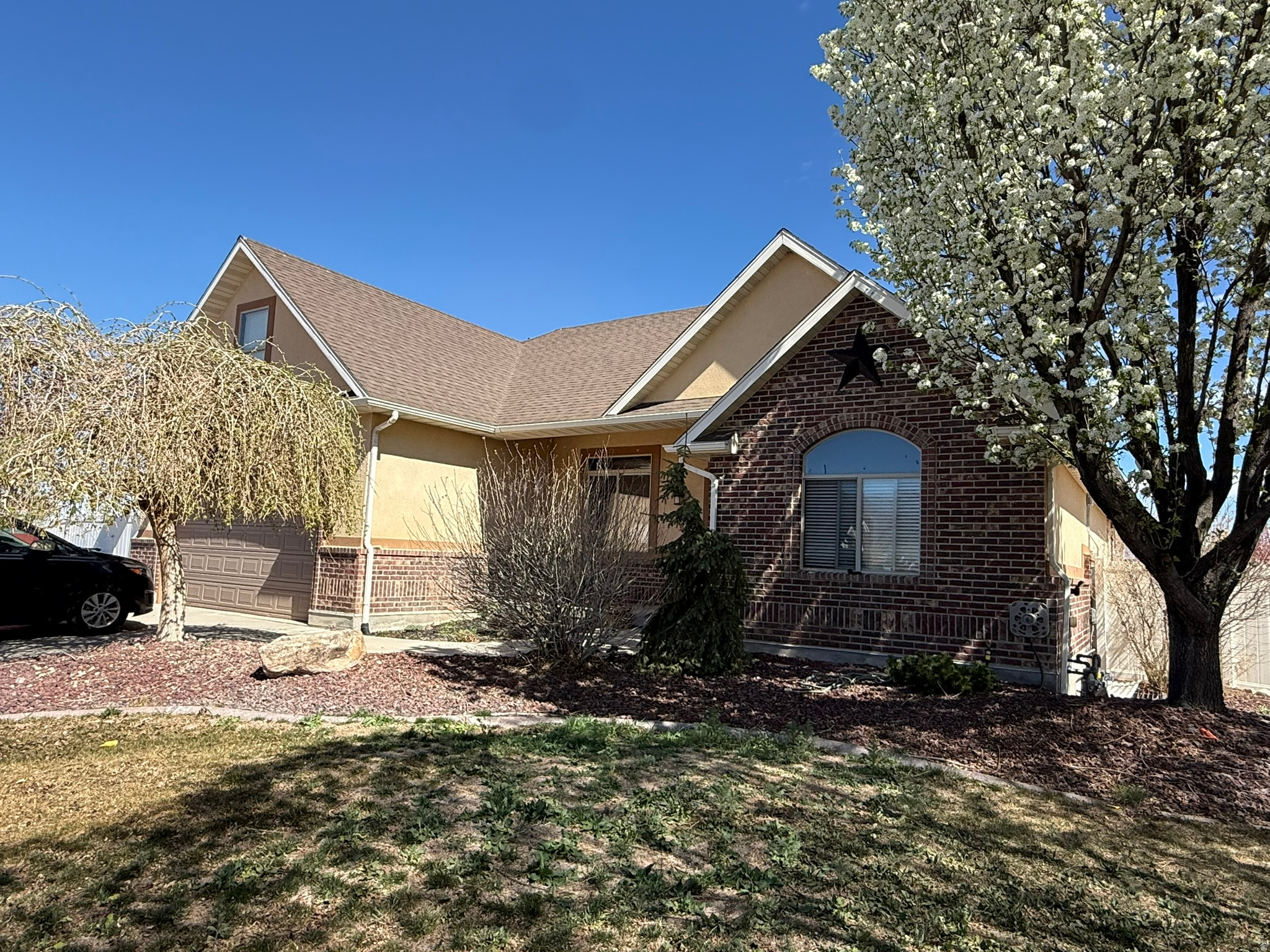 Beautiful full acre in Grantsville featuring 5 bedrooms and 3.5 baths, perfectly blending modern comfort with homestead living. The finished basement includes a kitchenette, ideal for guests or multi-generational living. This property is fully equipped for agricultural use with a custom chicken coop (secure, predator-proof), dedicated animal shelters for ducks, goats, or small livestock, a large hay barn for storage or projects, and premium garden infrastructure with 8 high-yield raised beds (48, totaling 256 sq ft) plus a drip irrigation system partially complete-just connect to the water line. Enjoy major upgrades including a new high-efficiency HVAC system with AC, tankless water heater, solar panel system for lower utility costs, and a fully rewired high-speed home network. A rare opportunity to own a turnkey property offering space, sustainability, and modern efficiency all in one! Buyer to verify listing information and square footage.