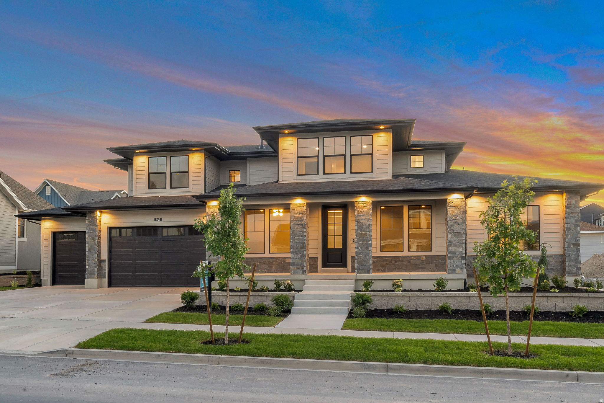 Lot#141 in Beacon Pointe by Symphony Homes. This stunning Browning XL plan blends luxury with thoughtful design. It was designed to be a model home, so it's stacked with lots of upgrades and designer finishes throughout, and it shows! The main floor features both a flex room (w/ French doors) and a formal living room, each with custom millwork, plus a grand great room with two-story beamed ceiling. The gourmet kitchen has ZLine appliances including a 48" dual-fuel range and built-in refrigerator and freezer, a spacious butler pantry, and a bright dining nook that opens to the covered patio. A custom mudroom bench and a large laundry room add everyday convenience. The expansive primary suite includes a custom closet with washer&dryer hookups and gorgeous bathroom. Upstairs has a loft open to below. All bedrooms feature walk-in closets. The fully finished basement is built for entertaining with a media room, kitchenette, huge game room, and a gym with 3/4 bathroom. Finished garage with epoxy floor, 9' foundation walls, an active radon system, and a cold cellar. A must-see!