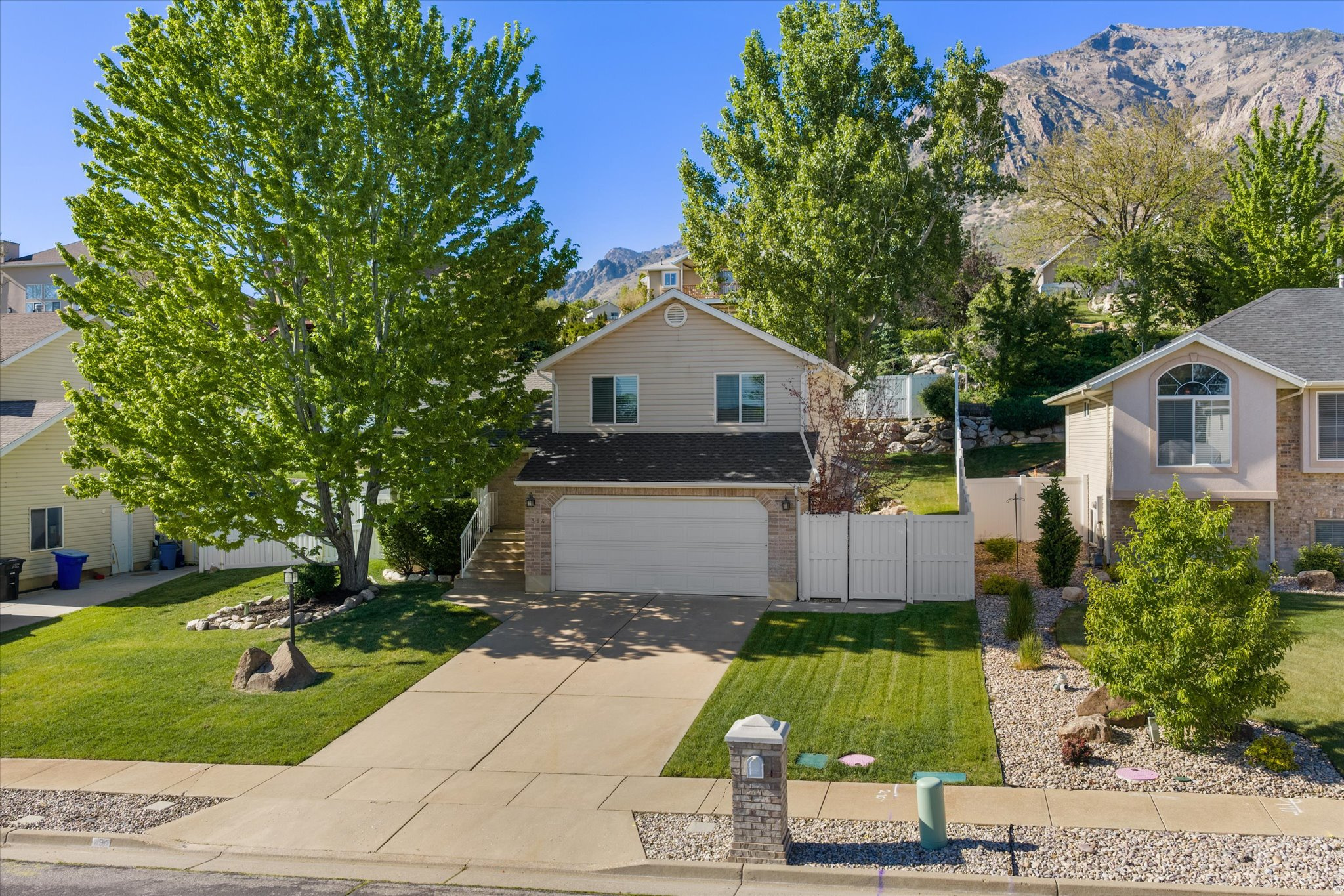 Tucked into a quiet neighborhood in the attractive Lakeview Heights area, this home is still conveniently close to North Ogden's thriving city center. Recent remodeling includes new carpet, fresh paint, a new gas fireplace, and a whole new kitchen, complete with solid-surface countertops, soft-close cabinets, and stainless steel appliances. The main floors also feature new energy-efficient LED lighting. Mature trees and a fully-fenced yard are ready for you to enjoy. A bedroom and bathroom downstairs offer a separate space for a home office or a guestroom. There is also plenty of storage room, and even the utility room has built-in shelving.  Worried about the HOA? Don't! The seller regrets leaving it behind. The monthly fee is less than $87 and includes a package negotiated by the HOA combining high-speed internet, cable TV, and equipment - a deal hard to beat in the open market. It's billed quarterly and has already been paid through June. Moreover, the HOA gives you access to a number of private parks and trails, plus a sense of community through seasonal activities such as the traditional Easter-egg hunt and the summer barbeque. This is all in addition to the assurance that property values will be maintained as you add your own personal touches to your new home. Follow up on this one soon, before it becomes somebody else's new home!