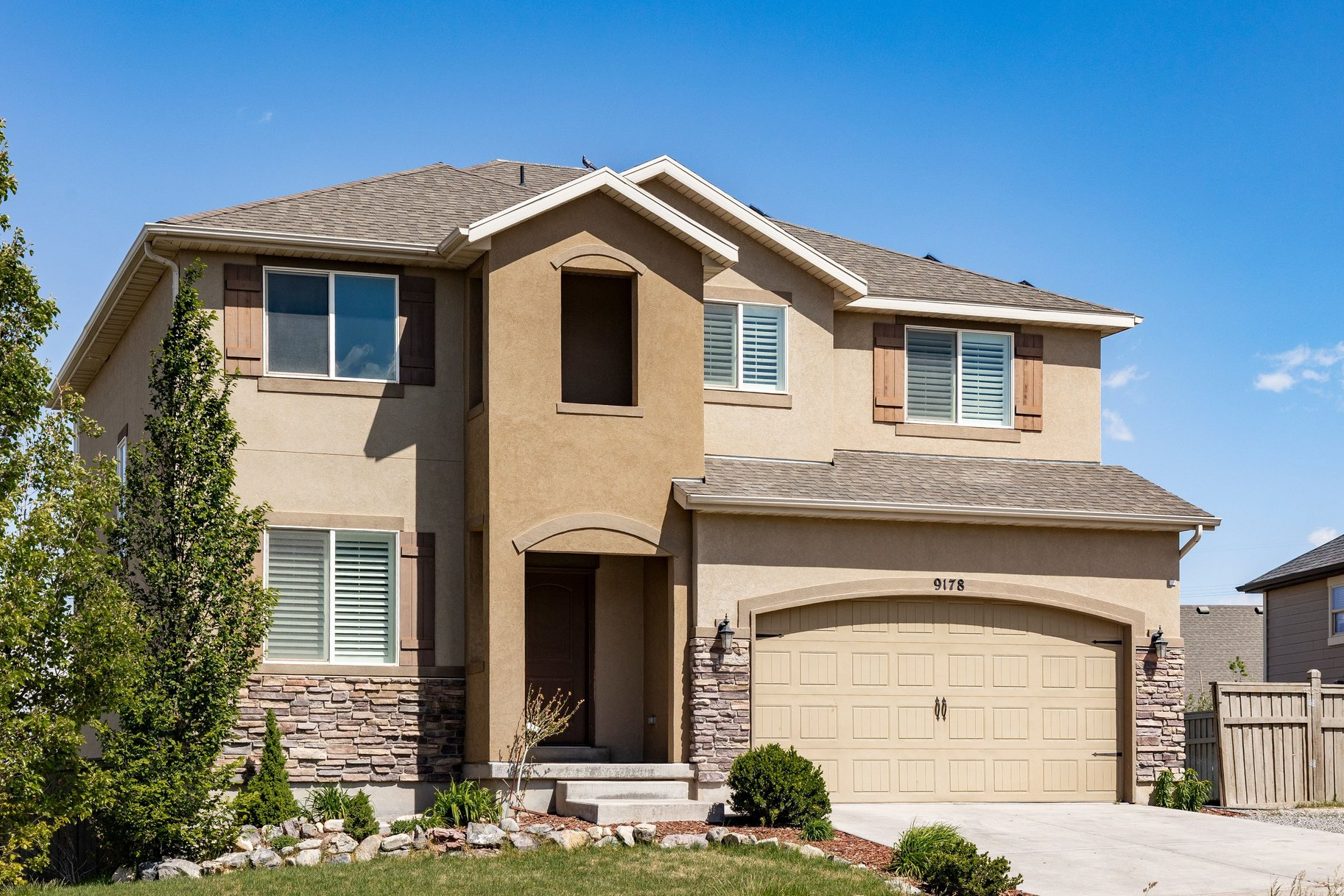 Located on a quiet street with lake and mountain views, this home offers quick access to Saratoga Springs, Lehi, Silicon Slopes, parks, trails, shopping, and schools. Open floor plan with 18-foot ceilings, large windows, plantation shutters, granite countertops, natural wood cabinets, pantry, and tech center. Main suite includes vaulted ceilings, walk-in closet, garden tub, separate shower, and views of the valley and lake. Additional bedrooms all feature walk-in closets plus a loft area for a second living room, office, or play space. Walk-out basement opens to a fully fenced backyard Solar panels help keep power costs down. Community amenities include pool, pickleball courts, playgrounds, and walking trails. Easy commute to Lehi, Thanksgiving Point, and major tech employers.