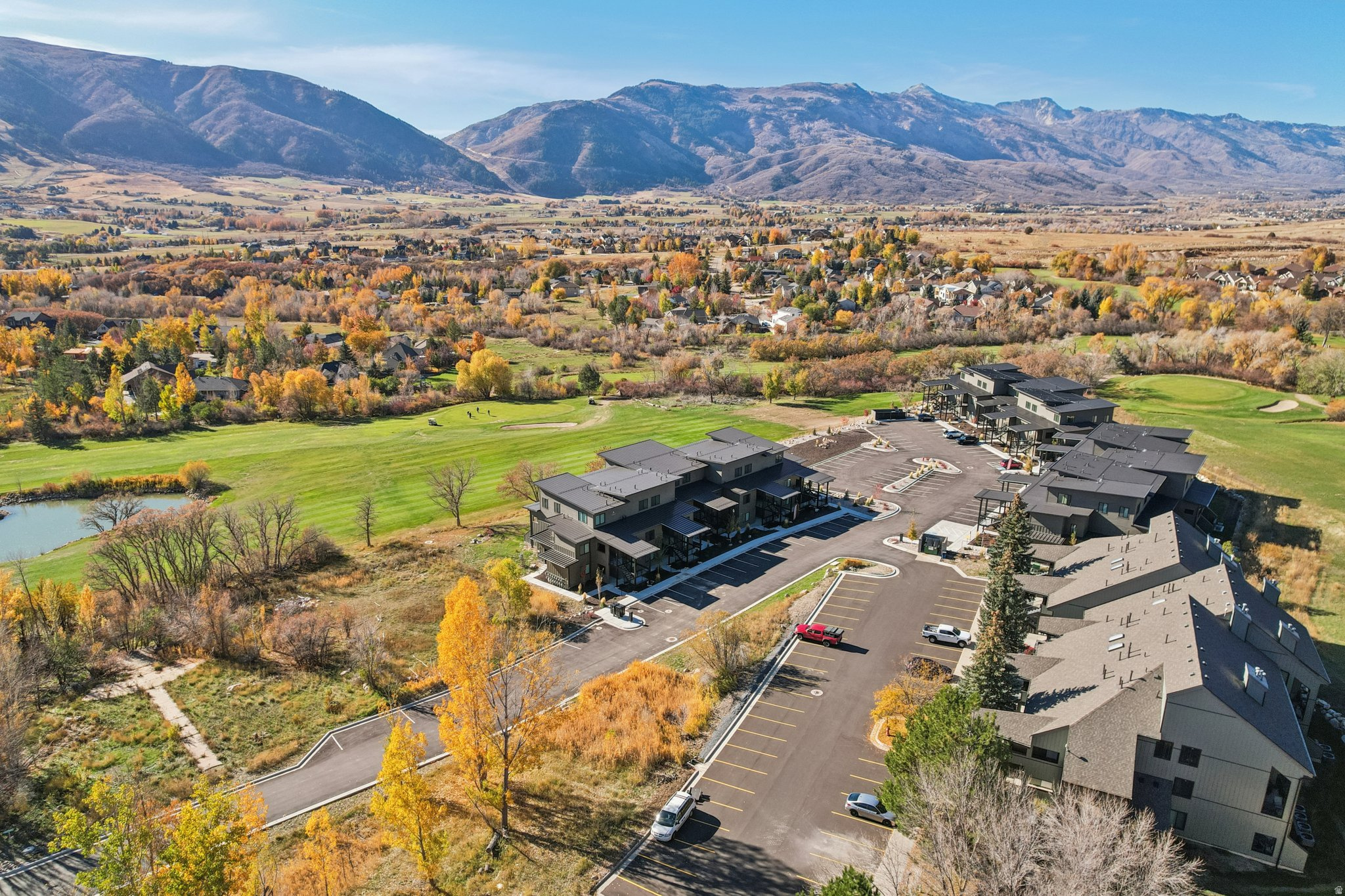 Fully Furnished Luxury Mountain Escape Experience elevated mountain living in this luxury, fully-furnished top-floor residence overlooking the Wolf Creek Golf Course with panoramic views of Nordic Valley ski resort and the back side of Eyrie Peak and the Wasatch Mountains. This two-story, designer-curated condo features soaring windows, an open concept living space, custom cabinetry, quartz countertops, and high-end furnishings throughout-ready for immediate enjoyment. Step onto your private balcony to take in sunrise alpenglow. Located in the heart of Eden, you'll have effortless access to Wolf Creek Golf Course, Pineview Reservoir, Powder Mountain, Nordic Valley, and Snowbasin. Short-term rental friendly, fiber internet included, and just under an hour