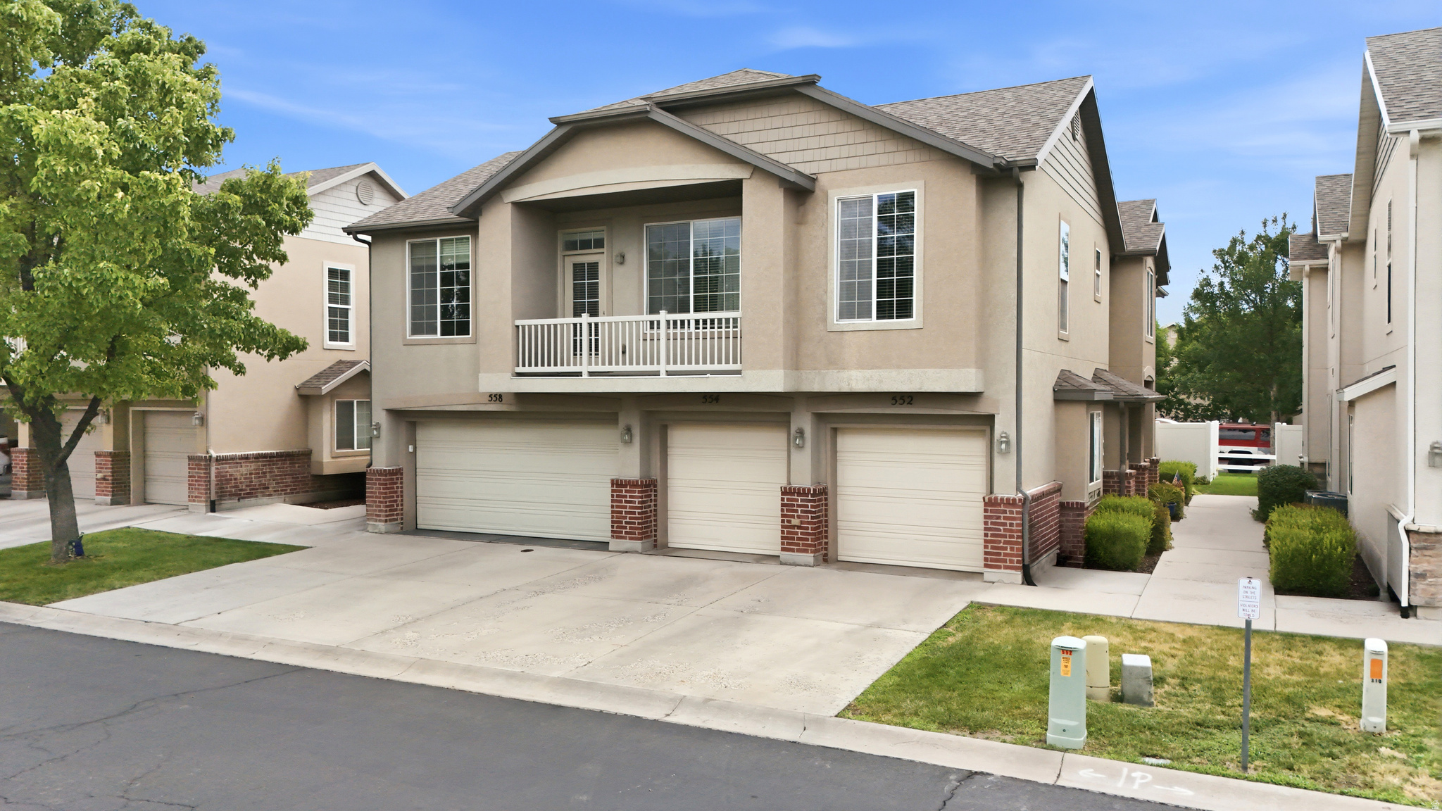 Sellers are offering $3,000 in concessions with a great offer. At $343,000 this one is hard to beat. End unit townhome in North Salt Lake with 2 bedrooms, 2 full baths, and 1,049 square feet that feels comfortable and functional from the moment you walk in. What stands out here is how well this home has been cared for. Fresh paint, newer AC, new water heater, newer fridge, new dishwasher, new garbage disposal, newer water softener, updated shower plumbing in the primary, and even the original furnace was just serviced and given a clean bill of health. The washer and dryer stay too. The working fireplace is a bonus on cold Utah nights, and the private balcony is the kind of spot you actually use. Primary bath has two sinks and plenty of space. The community checks the boxes as well, pool, clubhouse with reservable party space, fitness center, and a great walking path in a safe, family friendly neighborhood. Homes this clean and this updated at this price do not sit long.