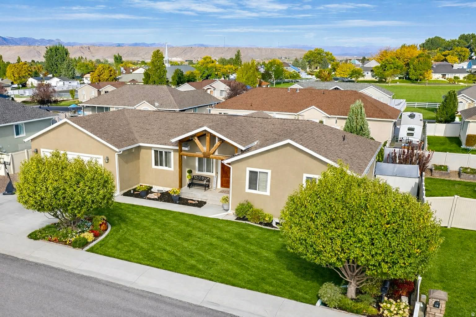 Located in one of Price's most sought-after and established neighborhoods, 108 North Balsam Drive offers an exceptional blend of space, style, and thoughtful upgrades across 3,024 square feet of beautifully maintained living space.  This impressive home features 5 spacious bedrooms and 3 full bathrooms, providing flexibility for family, guests, and entertaining. The heart of the home is warm and inviting, with generous living areas, quality finishes, and an effortless flow designed for both everyday living and hosting.  The newly remodeled basement is a true standout-featuring a large family room, perfect for movie nights or gatherings, and a wet bar that elevates the space into a premier entertainment area. Whether hosting friends or enjoying a quiet evening, this lower level adds both luxury and functionality.  Upstairs and down, you'll appreciate the abundance of storage, including a large garage with 18' door and extensive RV parking, making this property ideal for those with recreational vehicles, trailers, or multiple toys-an increasingly rare find in town.  Outside, the home sits in the heart of Westwood, known for its pride of ownership, peaceful streets, and upscale feel. This is a neighborhood where homes are cared for and value is protected.  With its combination of space, recent updates, RV parking, and premier location, this property stands out as one of the most complete offerings currently available in Price.   Square footage figures are provided as a courtesy estimate only and were obtained from County Records .  Buyer is advised to obtain an independent measurement.