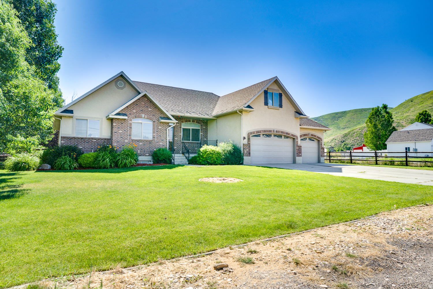 ***PRICE ADJUSTED!!!***Seller Financing/Lease Option available! Beautiful home on 1.06 acres, great horse property with 36x48 recreational barn/shop large enough for gatherings, toy/boat storage or animals with finished workshop/gym space. Turnout area with loafing shed, goat barn & chicken coop. Fully fenced and ready for all your needs. Generous backyard with covered patio & 9 person hot tub. Home offers an open layout, vaulted ceilings and large windows with abundant natural lighting. Main level living with primary suite offering separate tub & shower and walk in closet, 2 additional bedrooms, and full bathroom, laundry room with half bathroom. Upper level loft/flex space with a 3/4 bath and 2 bedrooms. Fully finished basement with separate outside entrance, kitchenette and dining space, family room, 3 bedrooms, bathroom with laundry hookups and large finished storage room. 2 Daniel Irrigation shares included. Beautiful mountain views and easy recreational access straight from your driveway. Close proximity to Heber's many amenities. Salt Lake City International Airport is 55 minutes away, Provo/Orem is just a quick 30 minutes. Buyer to verify all.