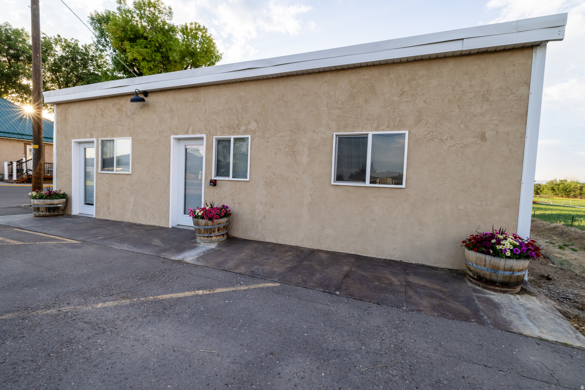 Prime commercial opportunity in a high-visibility location on 500 N in Vernal! This versatile property features an approximately 800 SF office/retail building built in 1980, offering flexible space ideal for a variety of business uses, Nice open space, bathroom and kitchenette area. The property includes 4 dedicated parking spaces in front, plus additional parking behind the building for customers, employees, or equipment.  Also included is a 1,200 SF Quonset shop built in 2006, perfect for additional business operations, storage, warehouse use, or workshop space. Two storage sheds provide even more functionality and flexibility. Zoned Commercial, this property offers endless possibilities for retail, office, service business, contractor space, or investment potential. Convenient location with excellent exposure and room to grow your business!