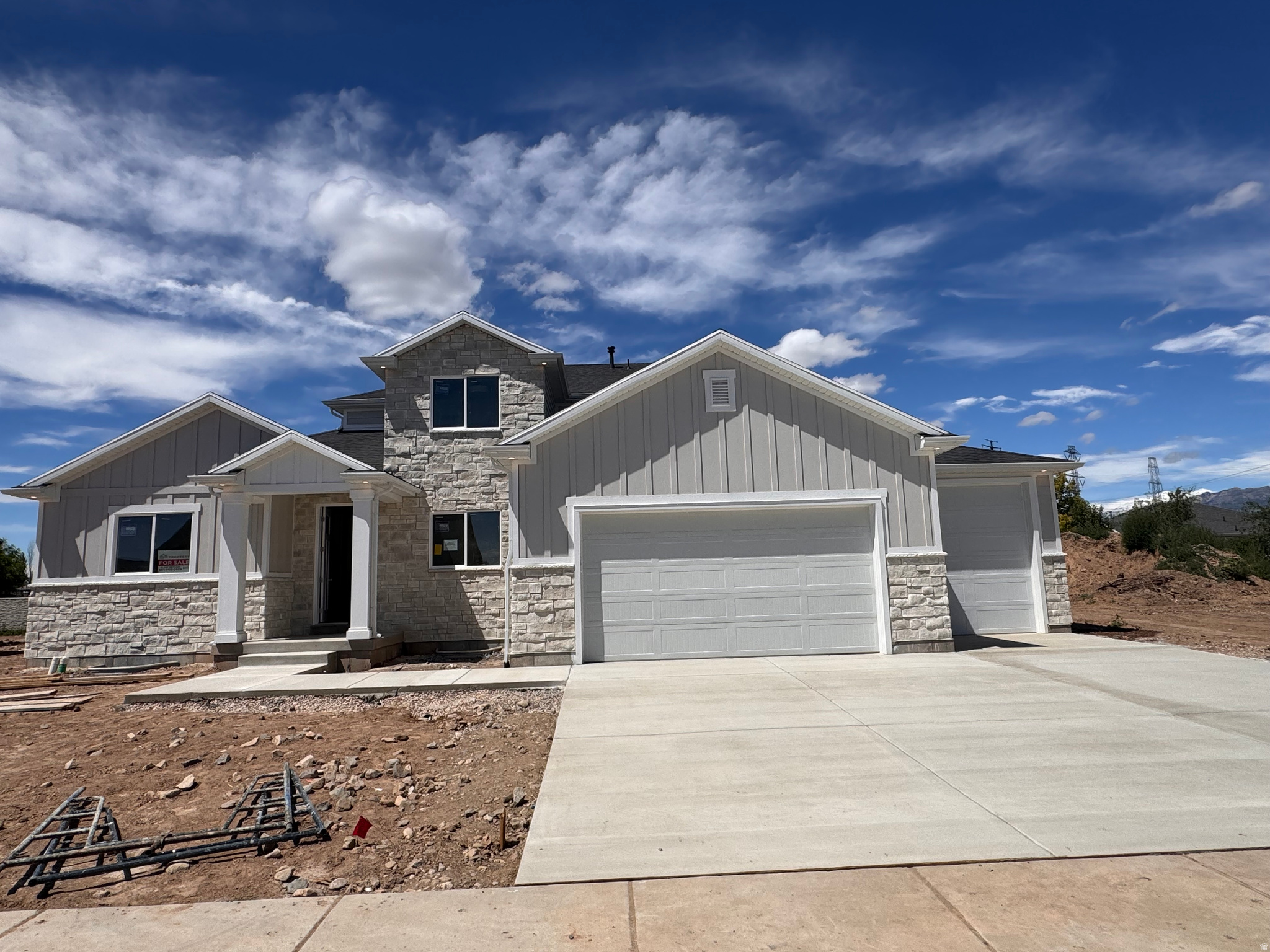 Welcome to Estates at Major Farms! Layton's newest luxury home community. Explore this Newport floorplan! This home features a main floor primary bedroom with expansive 17' tall great room ceilings. Huge U-shaped kitchen with a walk-in pantry. Oversized kitchen island and decorate range hood. Exterior features include a 4 car garage, covered patio, and front yard landscaping. Don't miss out on our amazing incentives! Selections for this home have been picked out, some items can still be picked depending on timing of going under contract. Estimated completion is August 2026.
