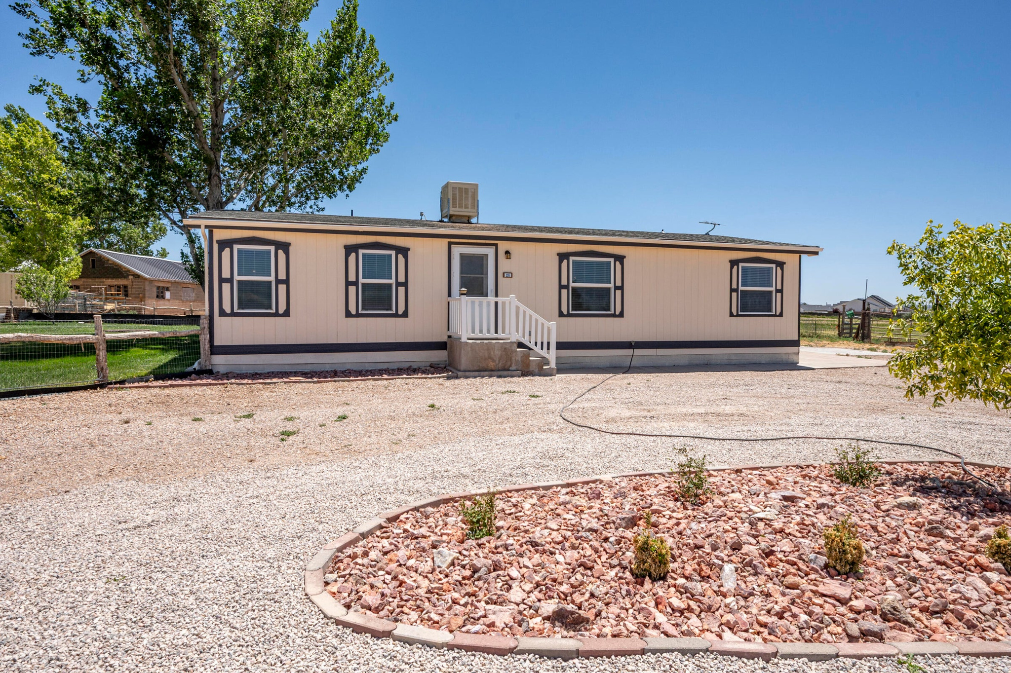 One acre lot within the Cedar City; with 3 bedroom; 2 bathroom home on it; that includes animal rights (see: 85894)