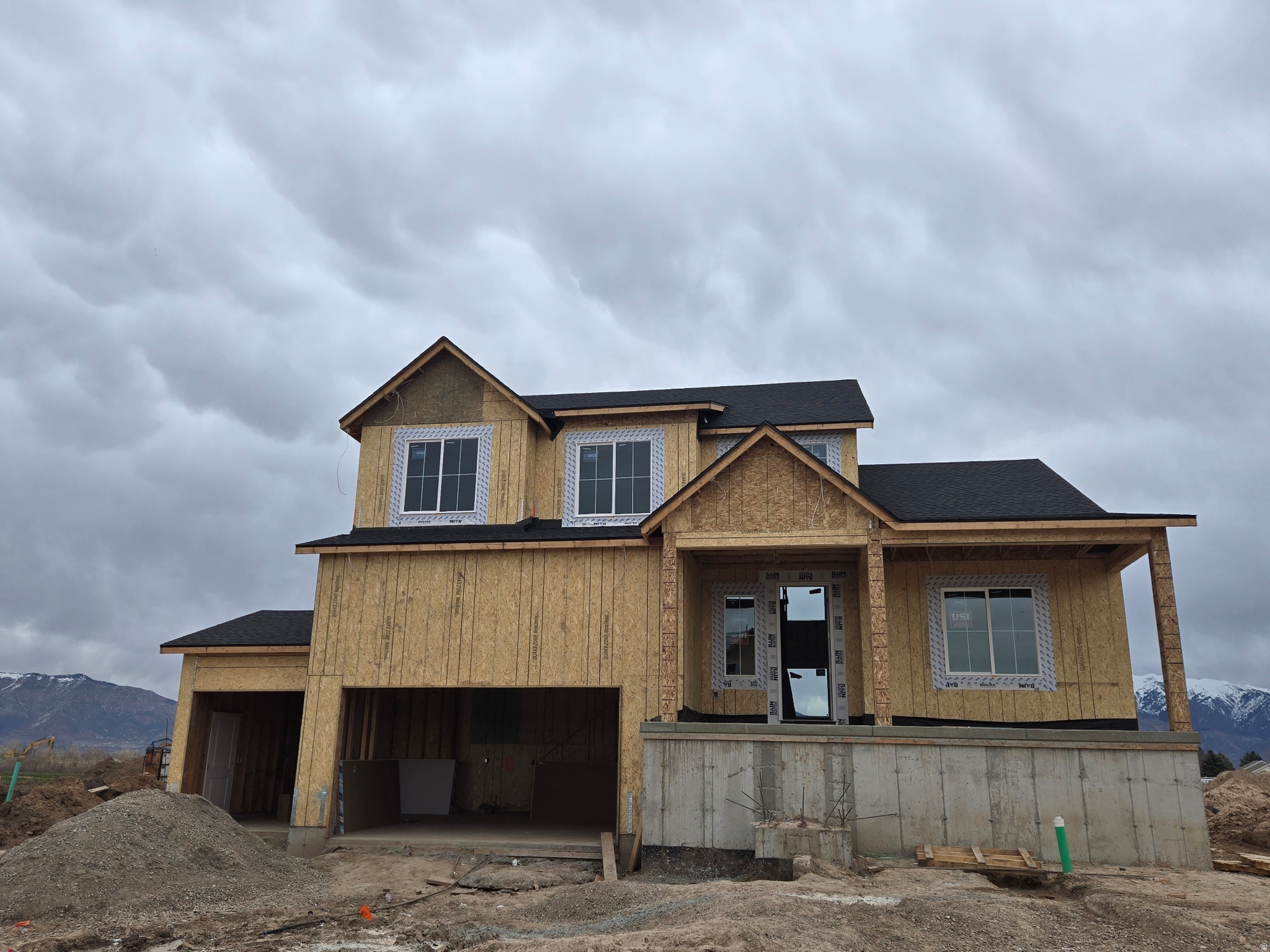 HUGE HOME, HUGE LOT, HUGE RATE BUY DOWN! Estimated completion MAY. Home is currently at foundation stage. A stunning 2 story on a .39-acre lot with incredible mountain views - even from the walk out basement. Featuring extra tall ceilings, the open layout includes 4 spacious bedrooms with the primary suite on the main level & rough in for stackable W/D in closet. The kitchen is equipped with double wall ovens, a sleek cooktop, and a layout ideal for entertaining. The home also features a separate basement entrance perfect for a future ADU! *Photos are of same plan in another community, not of actually home. Ask me about our Generous Home Warranties, Active Radon Mitigation System, and Smart Home Package which are all included. *No representation or warranties are made regarding school districts and assignments; conduct your own investigation regarding current/future school boundaries. Photos may or may not be of actual home. Buyers to verify colors, materials, and options. Square footage figures are provided as a courtesy estimate only and were obtained from building plans. See attached flyer for additional incentive info ***Sales Center Hours: Open Monday, Tuesday, Thursday, Friday, and Saturday from 11:00 a.m. - 6:00 p.m. Wednesday from 1:00 p.m. - 6:00 p.m. Closed Sundays. Call for an appointment!