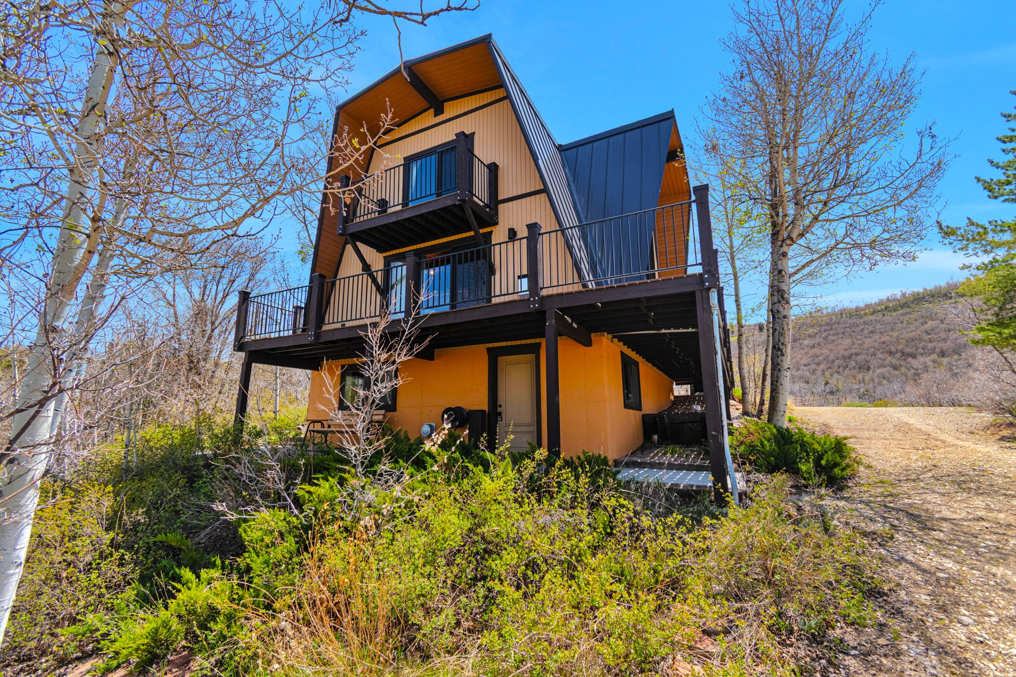 Easily accessible cabin,  only 5 minutes from bottom gate, and ready for move in. 3 bedrooms, 1.5 baths, and fun lower level has a game room with wet bar, and shop area with cabinet storage and workbench. Well maintained cabin, with newer Anderson double pane windows, and doors. Replaced metal roof, water heater, decks and railings, along with water line from meter. Extra land behind home, down to seasonal creek.  Square footage figures are provided as a courtesy estimate only and were obtained from appraisal.  Buyer is advised to obtain an independent measurement, and to verify ALL info to buyer's own satisfaction.