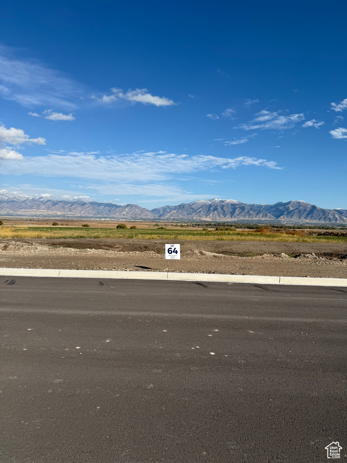 Bring your own Builder! Multiple lots available - Build your dream home in the peaceful and scenic community of Mendon. Blueberry Springs offers spacious 5/8+acre lots with breathtaking views of the mountains and valley. Enjoy paved public roads and full utility access, including Mendon City water, data, power, and secondary water stubbed to each lot. Irrigation water is managed and maintained by the Blueberry Springs HOA. Buyers are responsible for choosing and installing a septic system, subject to approval by Cache County. Each lot includes curb, gutter, and sidewalk frontage. This subdivision allows animal rights in accordance with Mendon City ordinances (https://mendoncityutah.gov). Bring your own builder and design your ideal home while adhering to city setbacks and protective covenants that maintain the neighborhood's appeal.