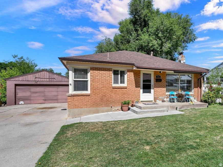 Fantastic home with a majestic mountain view. Nestled in Northern Ogden's East side bench. This sweet rambler with a cute fenced yard and garage side patio area is a must see. Bring your projects and enjoy the 220 V garage set up. Inside you'll love the timeless wood floors, quaint kitchen and open living room area. The Family room downstairs with a fireplace is being used as a bedroom but explore the possibilities that work for you. Relax and breathe it in. You are home.   Square footage figures are provided as a courtesy estimate only and were obtained from _County Records_ .  Buyer is advised to obtain an independent measurement.