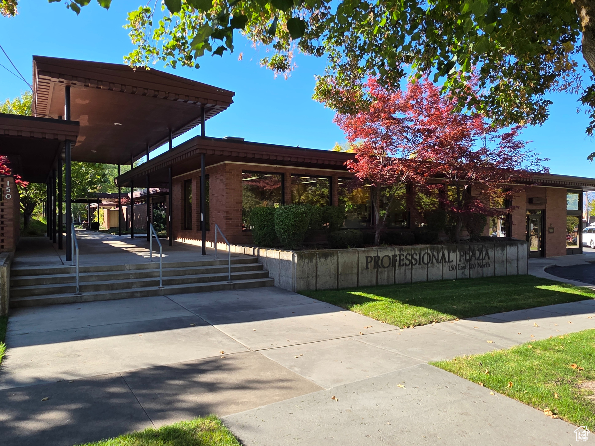 **Price Adjustment** Professional Plaza office space located one block off Downtown Logan Main Street. Entry to office is located in the beautiful plaza courtyard. Space would be great for any medical, counseling, financial, or similar professional type use.  Currently used as an endodontist office with 3 exam rooms, 1 lab room, 1 office/x-ray room, bathroom and reception area on main floor. Basement provides plenty of storage with washer/dryer hookups and conference/break room. Suite H.