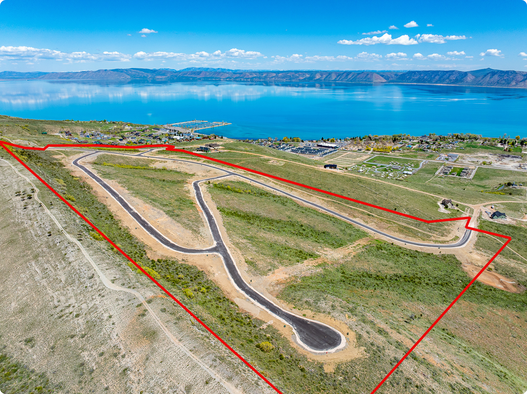Welcome to the Caribbean of the Rockies!  Lake view at Bear lake is a  new development in Garden city sprawled out on 66 acres . Boasting panoramic views of Beal Lake and surrounding mountains.  This development offers : Year round access  Paved roads  Access to ATV and hiking trails   Just minutes away from Beaver Mountain Ski resort, local shops, restaurants  and much more. Call the listing agent today to find out about developer special offer.