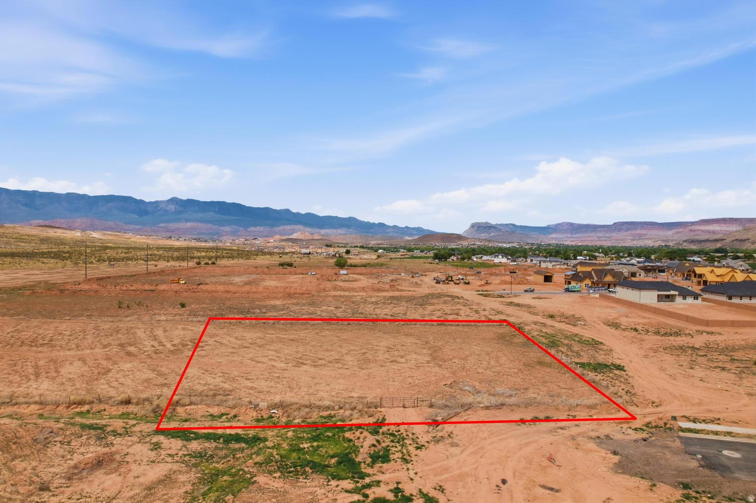 Opportunity is knocking in one of Southern Utah's fastest-growing communities. This over one acre parcel in the Hurricane Fields area offers the kind of elbow room that is quietly disappearing across Washington County - and the lifestyle to match. Whether your vision is a custom single-family home, a small farm, or a true ranchette retreat, the zoning is in place to make it happen. No HOA means no one telling you what to plant, park, or build. Utilities are already stubbed to the corner, giving you a meaningful head start on construction costs. A road dedication will be required - a standard step that your builder can coordinate with the county. For those thinking bigger, the adjacent 0.58-acre home-site to the east is also available. Combine the two parcels for a nearly 1.7-acre spread - plenty of room for a barn, pasture, garden, shop, or whatever your dream property calls for. Framed by the stunning red rock ridgelines and open skies that make the St. George area one of the most scenic places in the West, this lot delivers breathtaking mountain views in multiple directions. Hurricane is growing fast - but parcels like this, with acreage, no restrictions, and room to expand, are becoming genuinely rare. Buyers should be aware that soil testing has indicated the potential presence of collapsible soils on this parcel; Mitigating steps taken on this location and surrounding acreage have included alfalfa planting, together with abundant watering. Data (available upon request) from this neighborhood show a minimum 10-fold improvement in reducing collapsibility. If additional reduction measures are desired, AGEC geotechnical reports are available upon request and suggest "ponding" as a supplemental remediation method. Ponding measures (previously conducted nearby), together with appropriate post-excavation compaction, are believed to be an effective added ground preparation measure. Buyers are encouraged to review the reports and consult with a qualified geotechnical engineer as part of their due diligence.