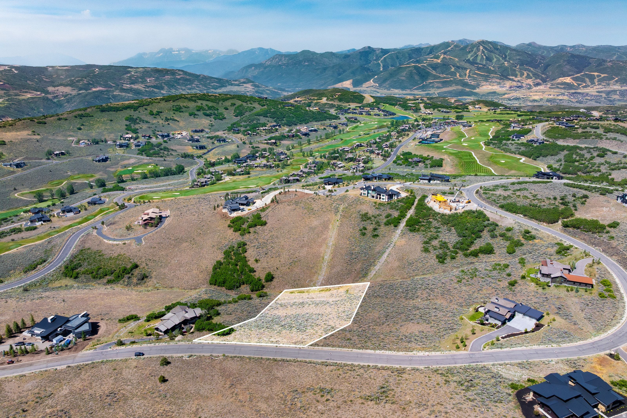 An exceptional opportunity to build your dream mountain retreat on this gently sloping 1.84-acre downhill homesite in Tuhaye, with a fullTalisker Club membership included in the list price. One of the largest homesites currently available in this price range, the property showcases sweeping views of the upper Wasatch Range, picturesque golf course vistas, and a coveted south/southeast orientation that fills the future home with abundant natural light throughout the day. Offering generous separation from neighboring homesites, this spaciousparcel in one of Tuhaye's most coveted neighborhoods provides a spacious and tranquil setting rarely found at this price point. An exceptional combination of size, scenery, buildability, and value within Tuhaye.  This homesite includes a full $200,000 Talisker Club Membership Deposit, with access to four private club locations featuring championship golf, world-class skiing, exceptional dining, fitness and wellness amenities, year-round programming, and endless four-season outdoor adventures.