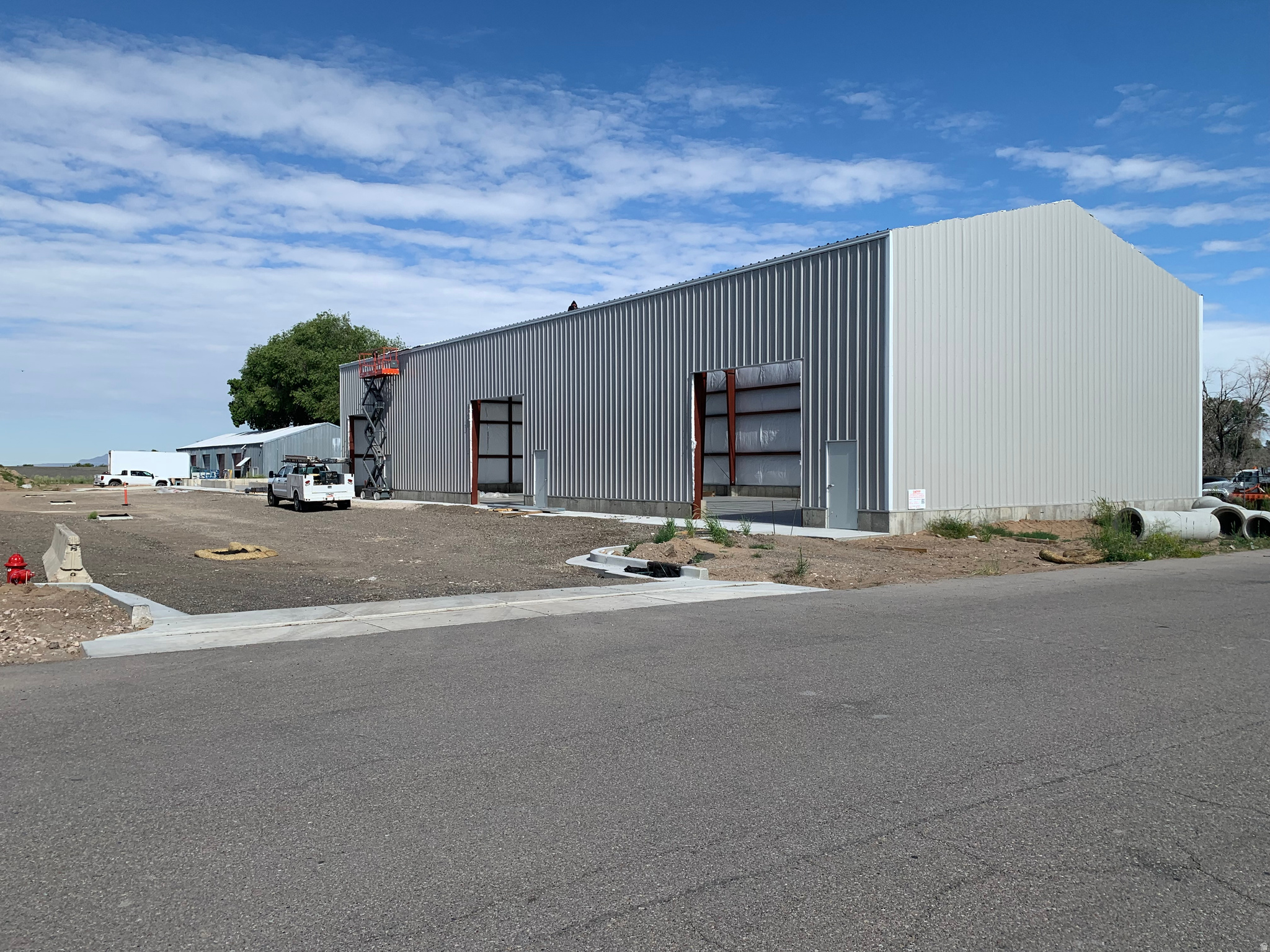 If you're seeking flexible, high-quality industrial space in Northern Utah, discover the newest multi-building business project coming soon to Ogden. Scheduled for occupation in mid-2026, this modern industrial complex offers flexible suites ranging from approximately 6,000 to 7,500 square feet, with options for larger users (up to 31,500 square feet). Flexible suite configurations can accommodate warehouse, manufacturing, distribution, or office/flex combinations and negotiable tenant improvements to suit your unique needs. Ogden City HUBZone certified and designed for maximum operational efficiency, the property features high clear-height ceilings, multiple overhead doors for easy loading and unloading, three-phase power to accommodate heavy equipment and manufacturing needs, and is zoned Ogden City M-2 for a broad range of industrial uses. The strategic location provides direct access to the freeway and major roads, making distribution and logistics seamless, while tenants will also benefit from ample parking and excellent truck circulation throughout the site. Ogden's northern Utah location further ensures convenient access to major transportation routes, making this premier flex space an ideal choice for growing businesses. For more information, or to discuss tenant improvements, contact the leasing team and secure your spot before it's gone!