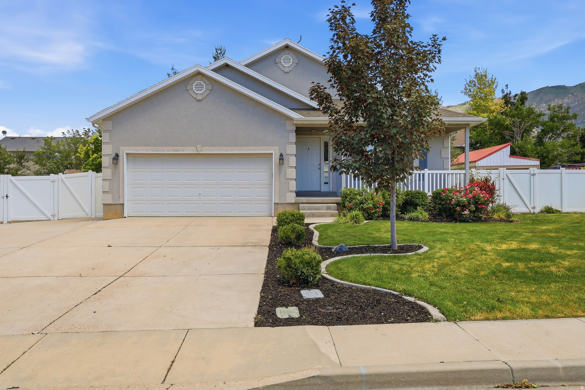 Don't pass up the opportunity to offset your mortgage with this 5 bedroom, 4 full bathroom rambler featuring a full basement apartment with a legal accessory apartment that rents for $1,349/month, complete with its own separate entrance, its own laundry hookups, and plenty of parking on the RV parking pad. This home offers spacious, light-filled rooms throughout, including a great room, formal living room, and spacious kitchen, along with a fully landscaped yard, auto sprinklers, and vinyl fencing, all set in a neighborhood of newer homes. Recently updated with fresh paint throughout both levels, brand-new carpet upstairs, and new hard flooring downstairs, this beautiful home is move-in ready and full of opportunity!