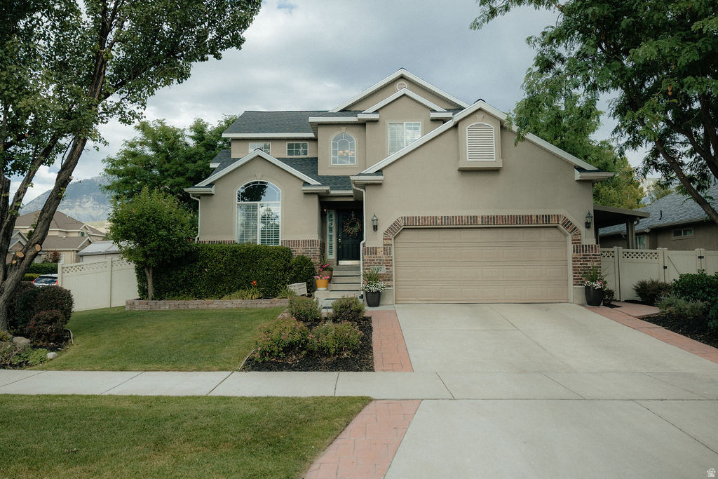 Stunning home with so many upgrades and extras!  Brand new roof, amazing entry, 9' basement ceilings,  hardwood floors, surround sound wiring, new and beautiful pergola, vinyl  fence, & large deck to name just a few.  You will want to see this home in person! It has an open spacious floorplan but also offers a comfortable and cozy feel.  The rooms are large, the decor is updated and classy, the grounds are lush and parklike.  The neighborhood is a gem and location couldn't be better.  Call today for your private showing in Verona Estates, you deserve a home like this!