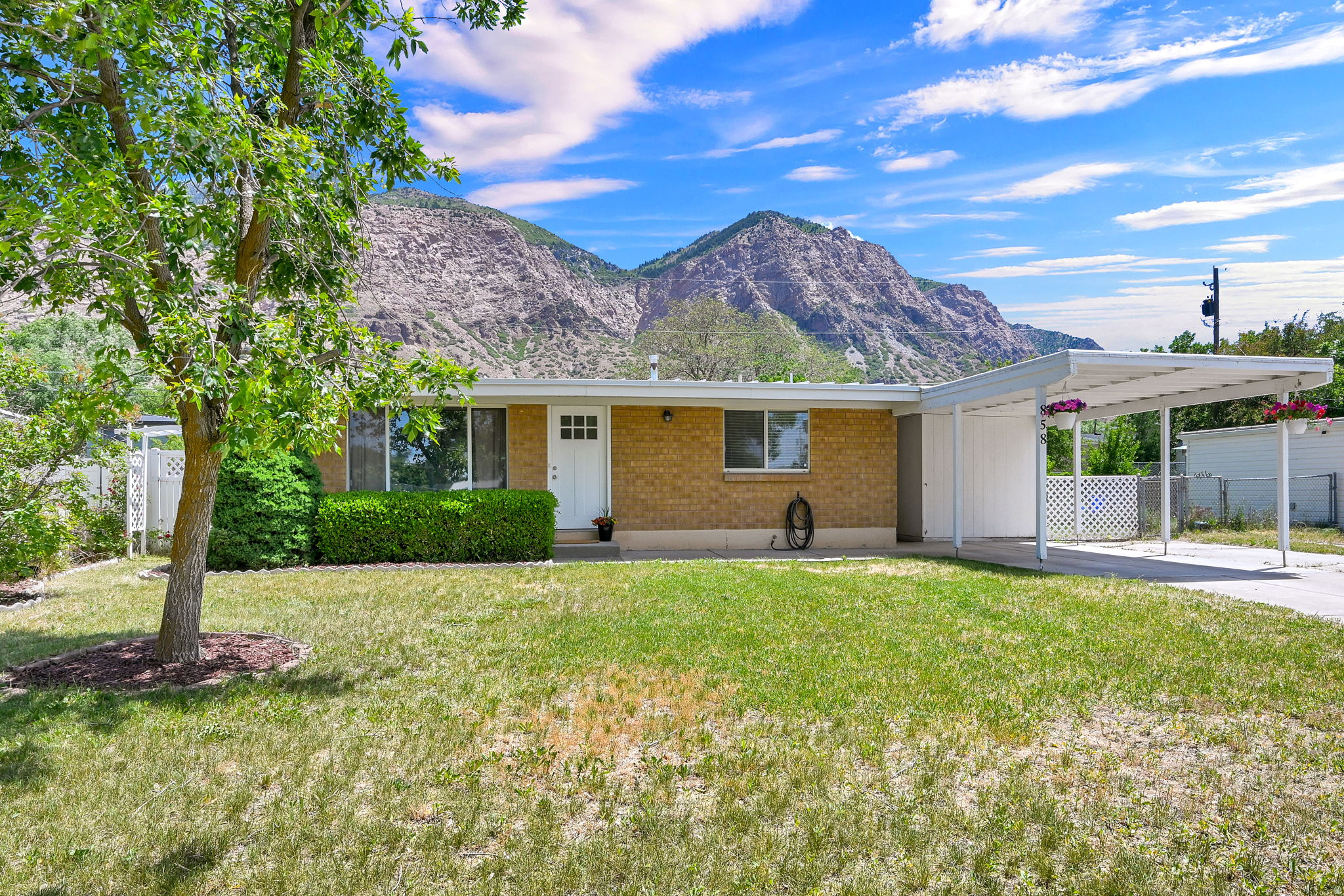 Welcome to 858 N Monroe Blvd in Ogden, Utah, a charming home perfectly positioned for those who love both convenience and the outdoors! This 3 bedroom, 1 bathroom home offers incredible mountain views and easy access to some of Northern Utah's best hiking, biking, and outdoor recreation. Located just minutes from Ogden Canyon, Weber State University, Snowbasin Resort, Powder Mountain, and countless nearby trails, this home is ideal for anyone looking to enjoy the Utah lifestyle year-round. Inside, you'll find a comfortable layout filled with natural light and a warm, inviting feel. With main level living, spacious bedrooms, and an updated kitchen this home is one you must see! Step outside and take in the stunning Ogden Mountain views right from your property. Whether you're heading up the canyon for skiing, hiking, paddleboarding, or simply enjoying the scenery, this location puts adventure right at your fingertips. Commuters will love the quick freeway access, making travel to Hill Air Force Base, downtown Ogden, Salt Lake City, and surrounding areas simple and convenient. Shopping, restaurants, grocery stores, entertainment, and everyday amenities are all just minutes away. If you've been searching for an affordable Ogden home with mountain views, trail access, outdoor recreation nearby, and an unbeatable location close to skiing, shopping, and the freeway, this is one you won't want to miss!  Square footage figures are provided as a courtesy estimate only and were obtained from county records. Buyer is advised to obtain an independent measurement.
